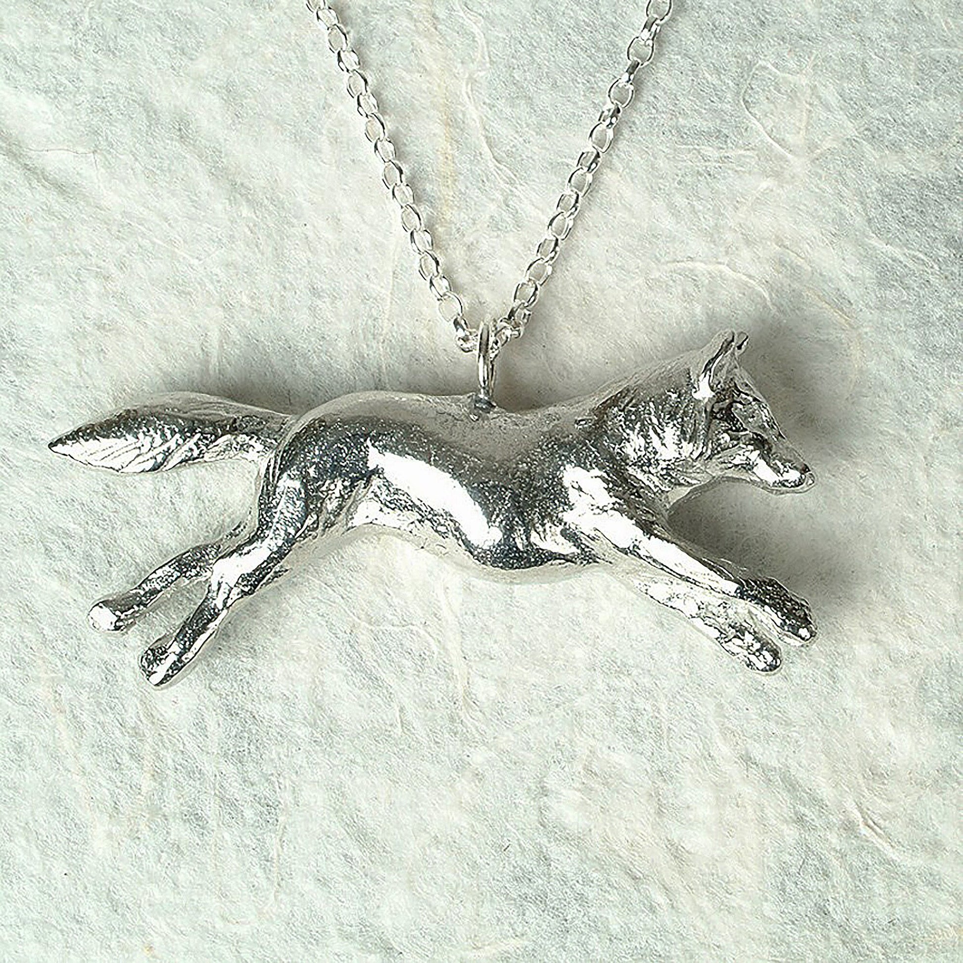 A detailed pewter running fox necklace on an 18" Sterling silver chain. Great jewellery gifts for her, fox gifts for fox lovers. Hunting gifts, country gifts. The perfect 10th tin 10 year wedding anniversary gift (Our pewter is 95% tin). Made in Britain with love.