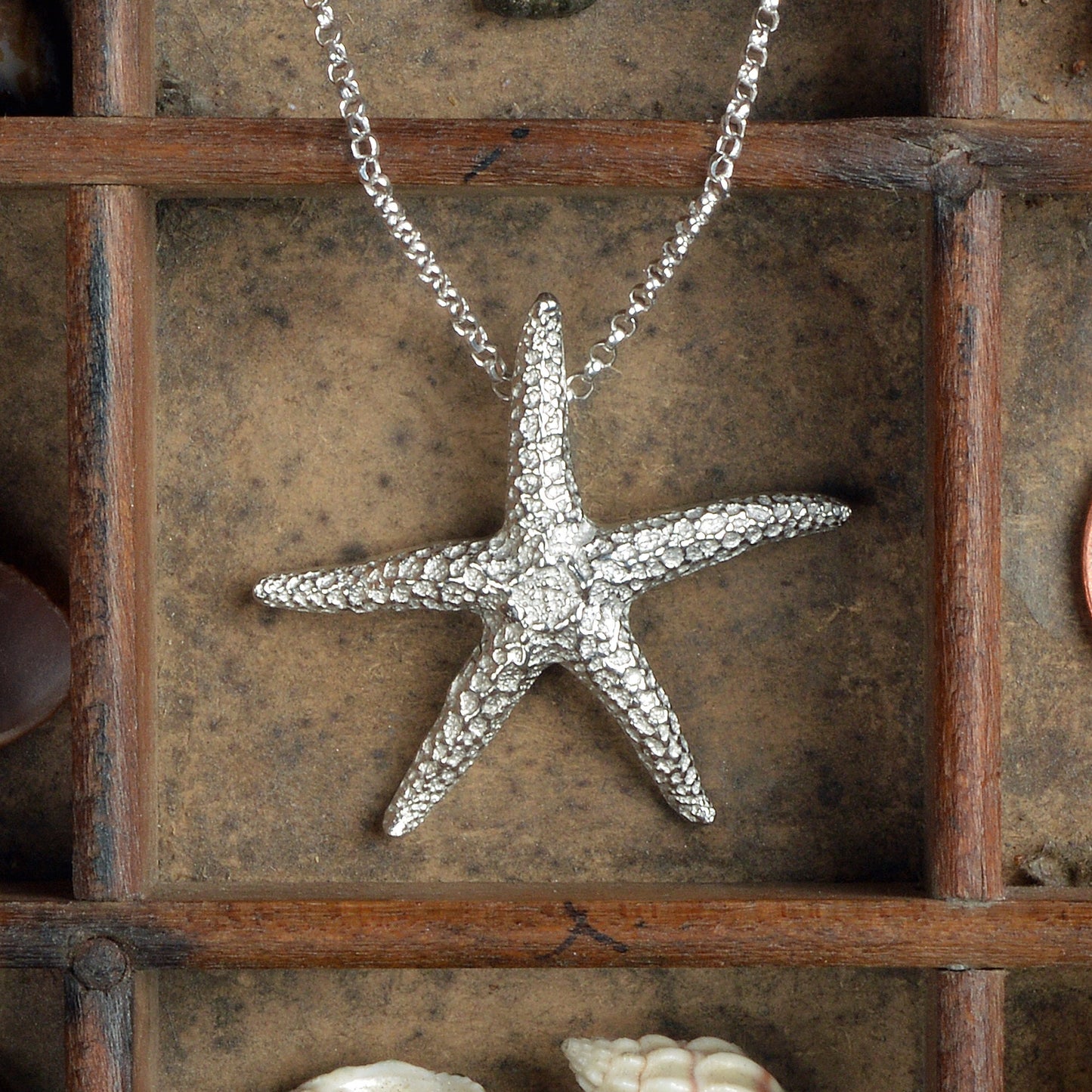 A delicate and detailed pewter starfish necklace on an 18" Sterling silver chain. Great jewellery gifts for her, nautical gifts starfish gifts. The perfect 10th tin 10 year wedding anniversary gift (Our pewter is 95% tin). Made in Britain with love.