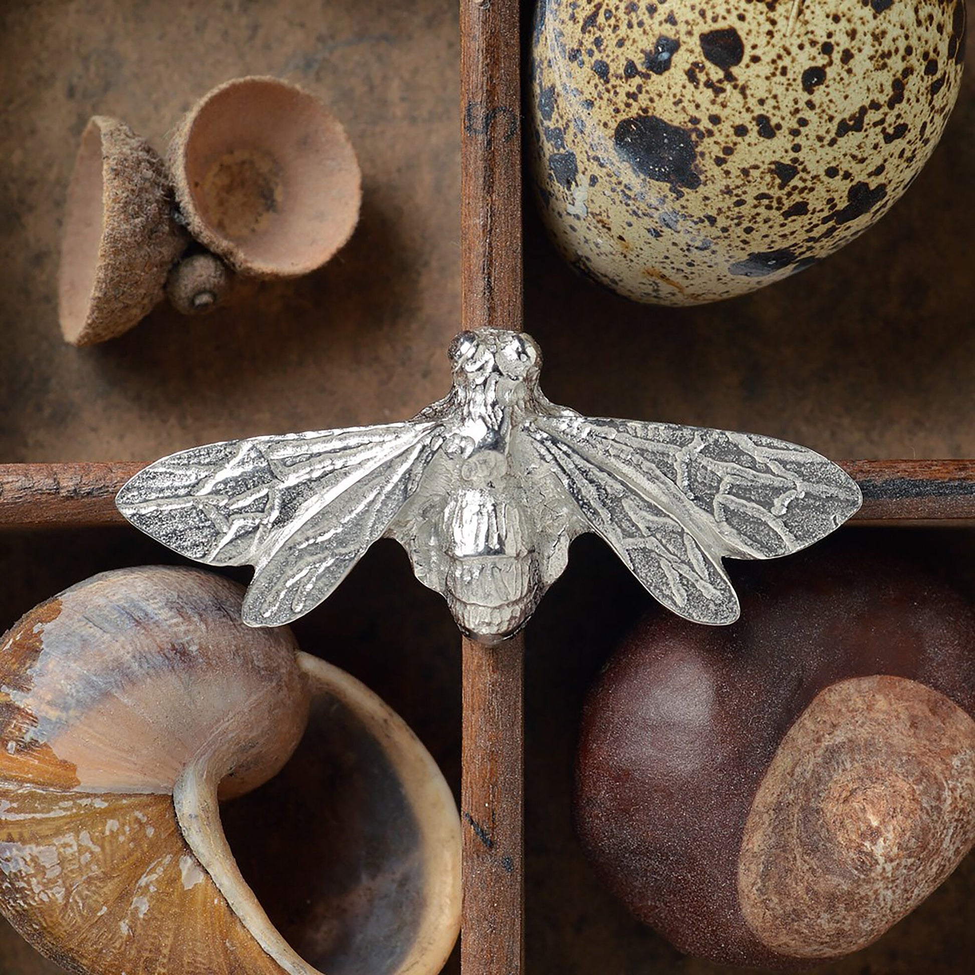 A beautifully detailed pewter honey bee brooch. Gifts for bee lovers, bee gifts. This attractive bee brooch features delicately 'lacey' wings and an intricately sculpted body in celebration of our much-loved honey bees.