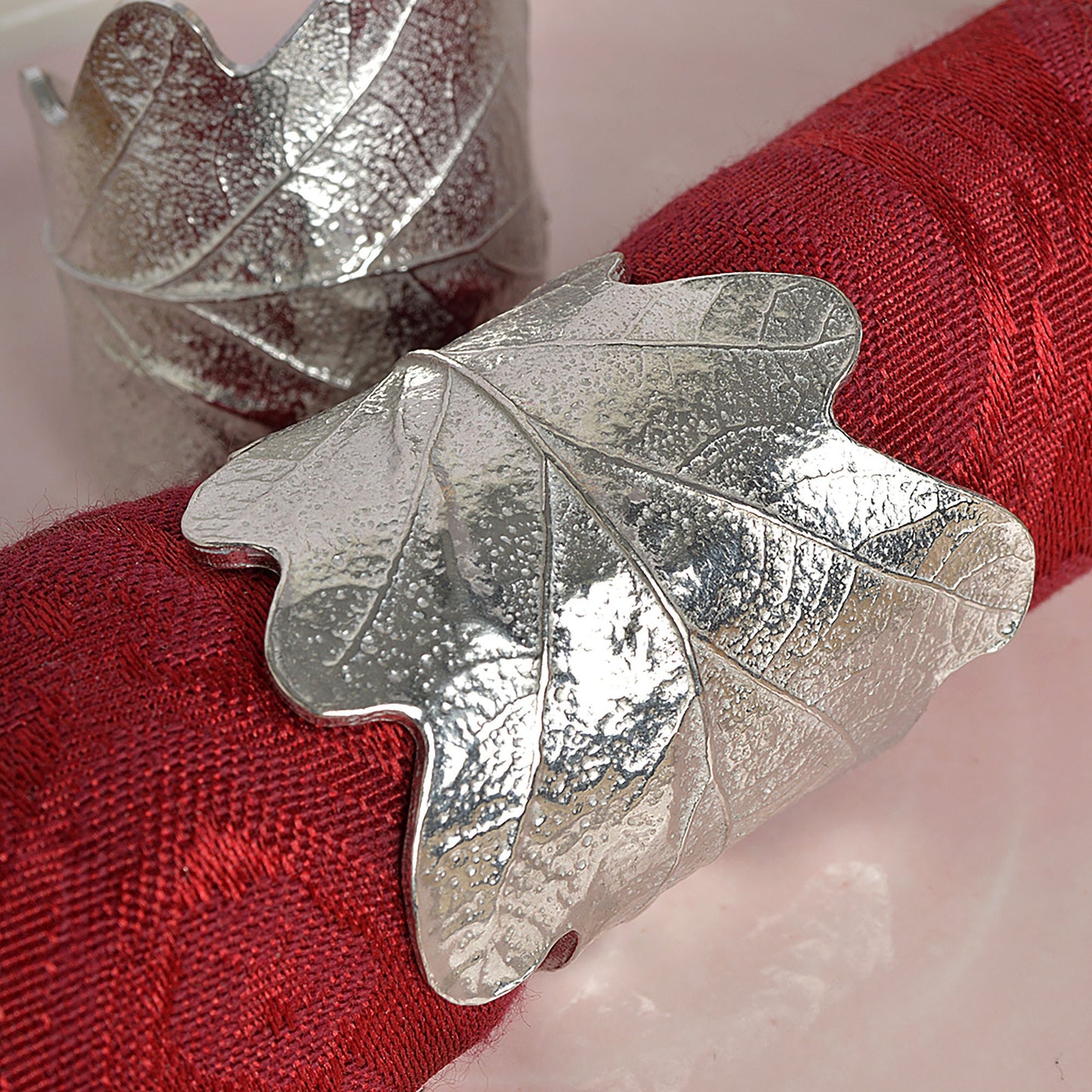Oak leaf & acorn napkin rings set of 8. Detailed cast oak leaves with acorns curled into a practical & useful serviette rings. Small wedding gifts, gifts for nature lovers. Pewter tableware gifts for couples. Housewarming or wedding gifts UK made