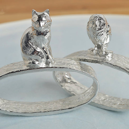 A delightful pair of pewter owl & pussycat pewter napkin rings. A perfect 10th (Tin) ten year wedding anniversary gift (Our pewter is 95% tin). The perfect gift for any loving couple! Great housewarming gifts or wedding gifts, UK made.