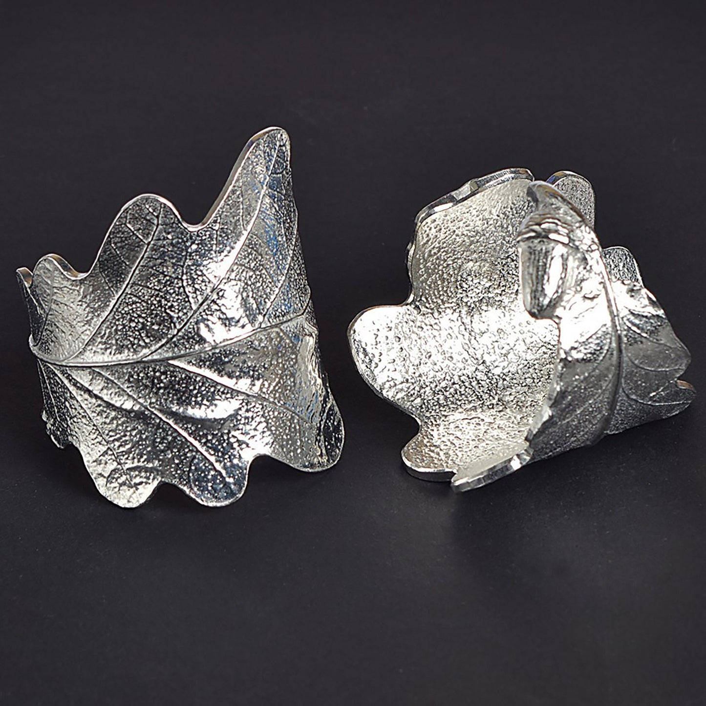 Oak leaf & acorn napkin rings set of 8. Detailed cast oak leaves with acorns curled into a practical & useful serviette rings. Small wedding gifts, gifts for nature lovers. Pewter tableware gifts for couples. Housewarming or wedding gifts UK made