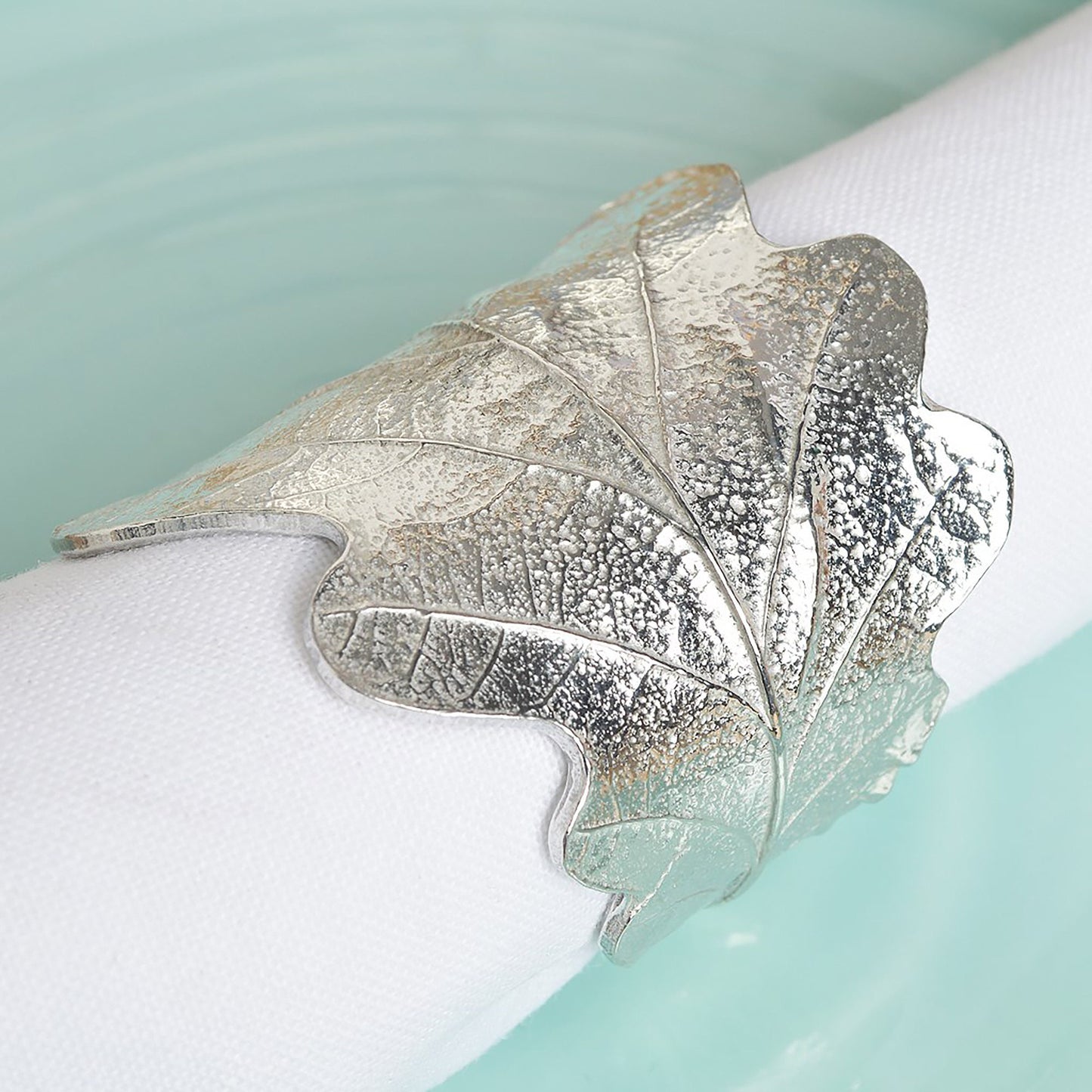 Oak leaf & acorn napkin rings set of 8. Detailed cast oak leaves with acorns curled into a practical & useful serviette rings. Small wedding gifts, gifts for nature lovers. Pewter tableware gifts for couples. Housewarming or wedding gifts UK made