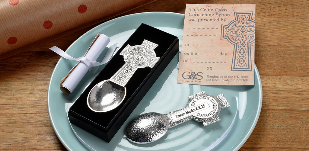 Christening spoon. A Celtic cross spoon with an engraved message on the back with the words On Your Christening. Personalised Christening gifts for girls and boys