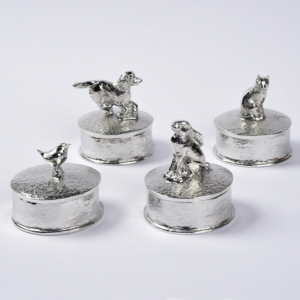 A collection of handmade pewter trinket boxes, keepsake boxes many of which can be personalised by engraving. Our designs feature sculptures of British wildlife, animals and birds. All made by Glover and Smith in Britain in our own studios