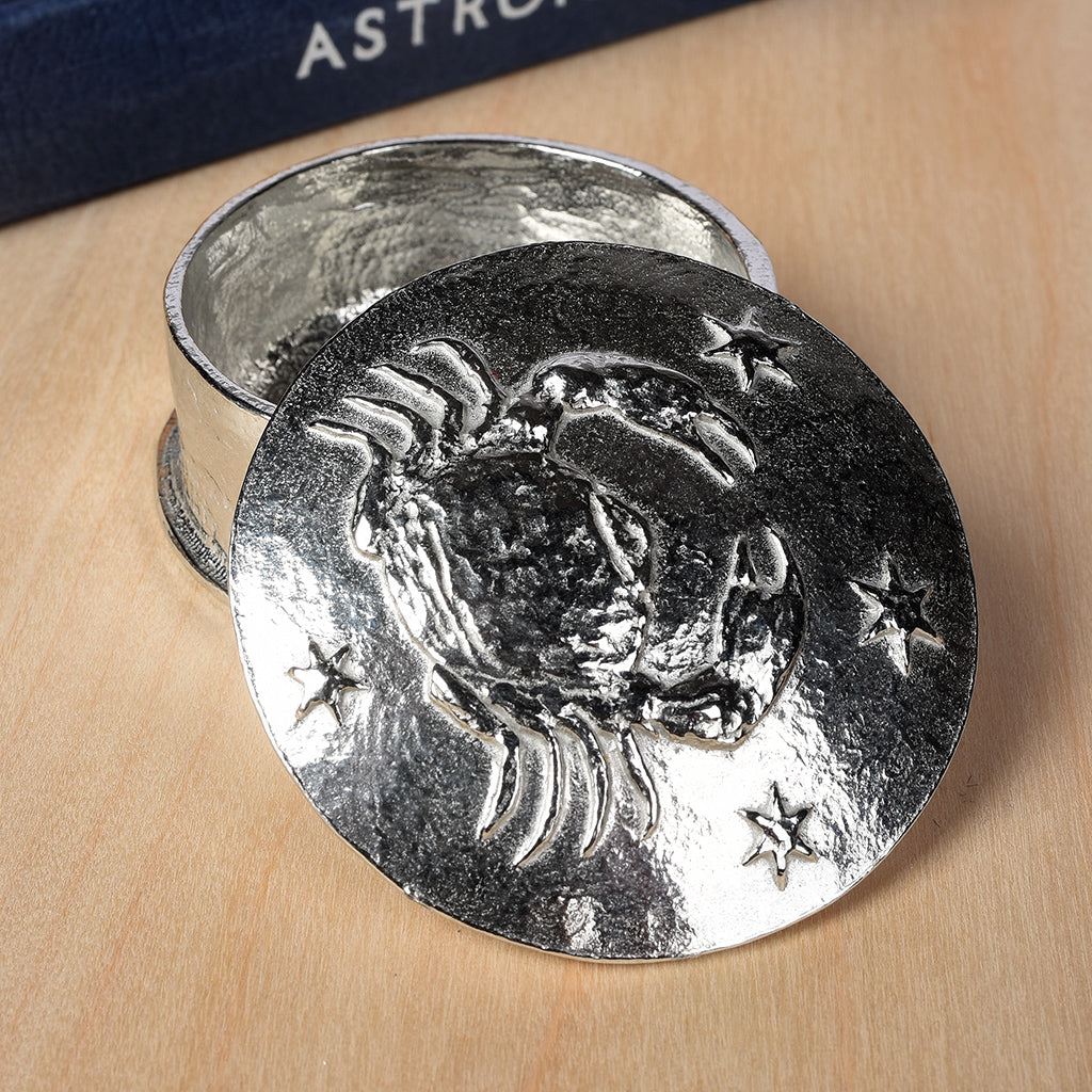 A beautifully detailed and textured Cancer crab zodiac sign guards precious treasure on this personalised pewter trinket box. Pensonalised birthday gifts for Cancer. The underside of the lid can be engraved with your personalised message.