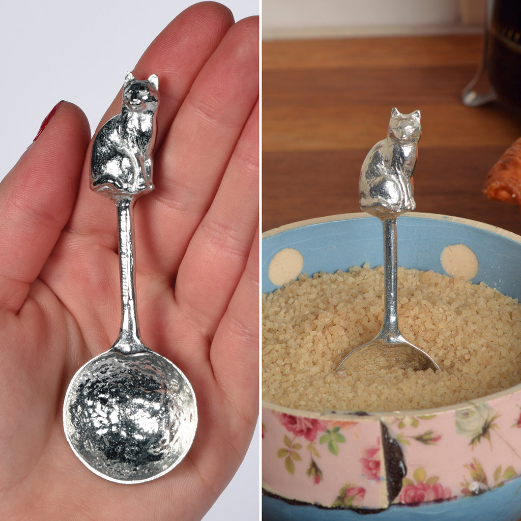 A small spoon pewter sugar spoon. A round bowled spoon on a straight handle leads to a perfectly sculpted cat. Practical & useful cat gifts for cat lovers. UK handmade