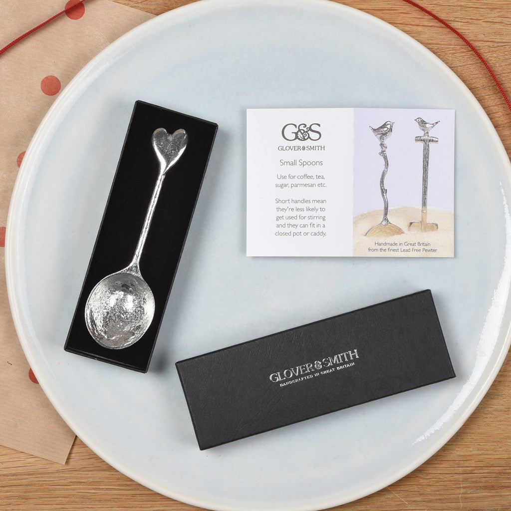 A small spoon pewter sugar teaspoon  with a love heart on the end. Our love spoon makes an ideal little love token or 10th tin wedding anniversary gift or small wedding gift.