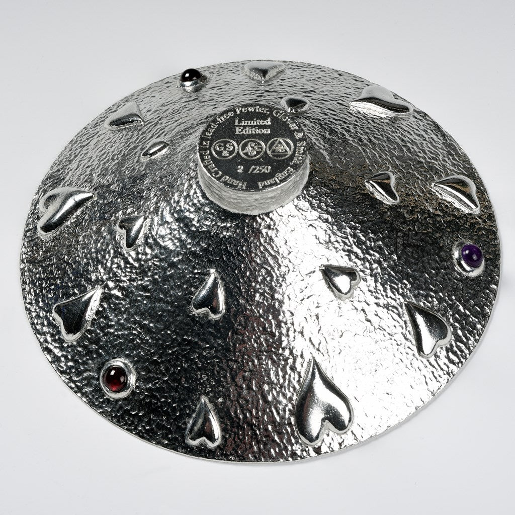  A large round pewter bowl encrusted on hearts, amethysts & garnets. The designated material for a tenth wedding Anniversary is tin. Our Lovers bowl makes the perfect 10th Tin 10 year wedding anniversary gift (our pewter is 95% tin). Edition of 250