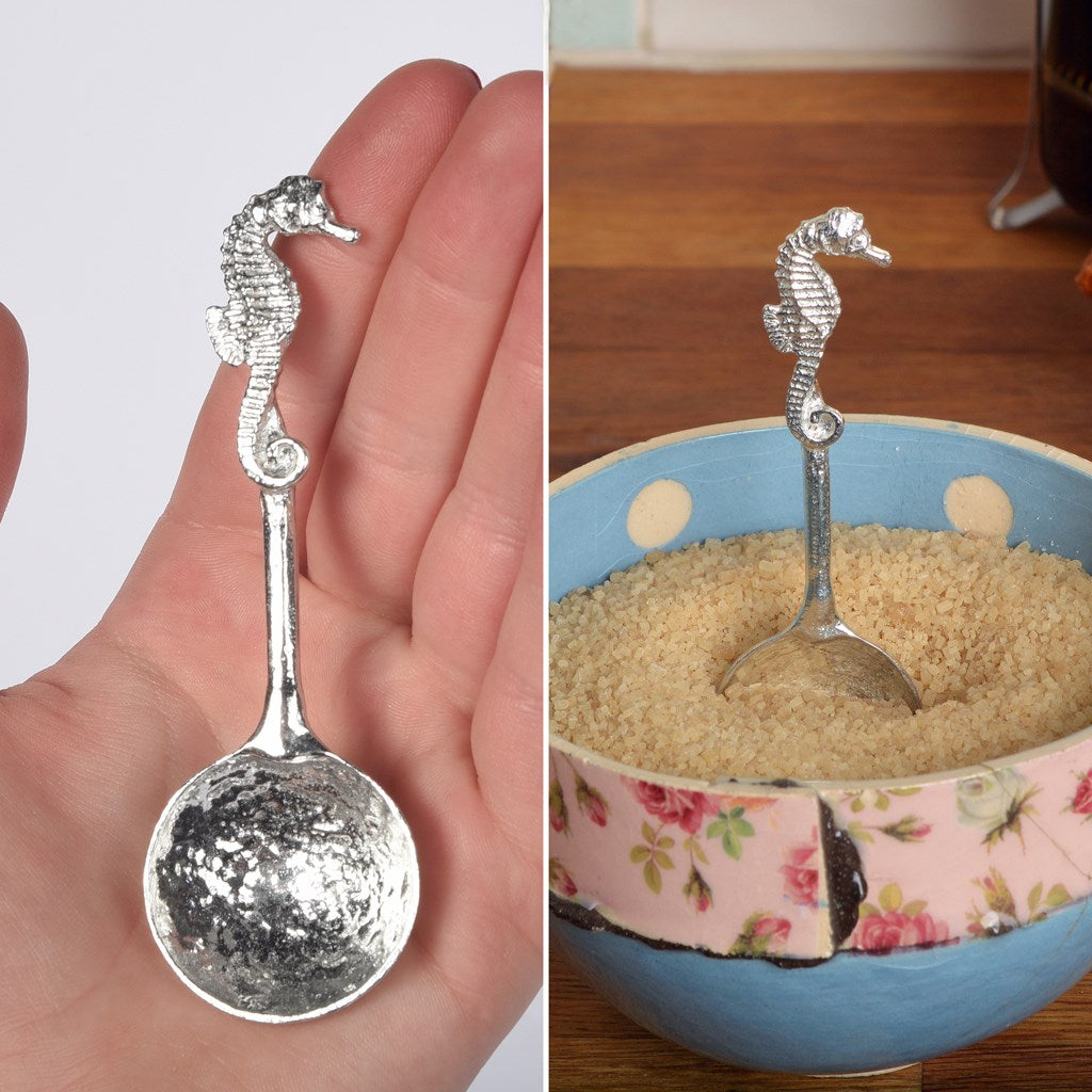 A small spoon pewter sugar spoon. A round bowled spoon on a straight handle leads to a perfectly sculpted seahorse. Practical & useful nautical gifts for seahorse lovers. UK handmade