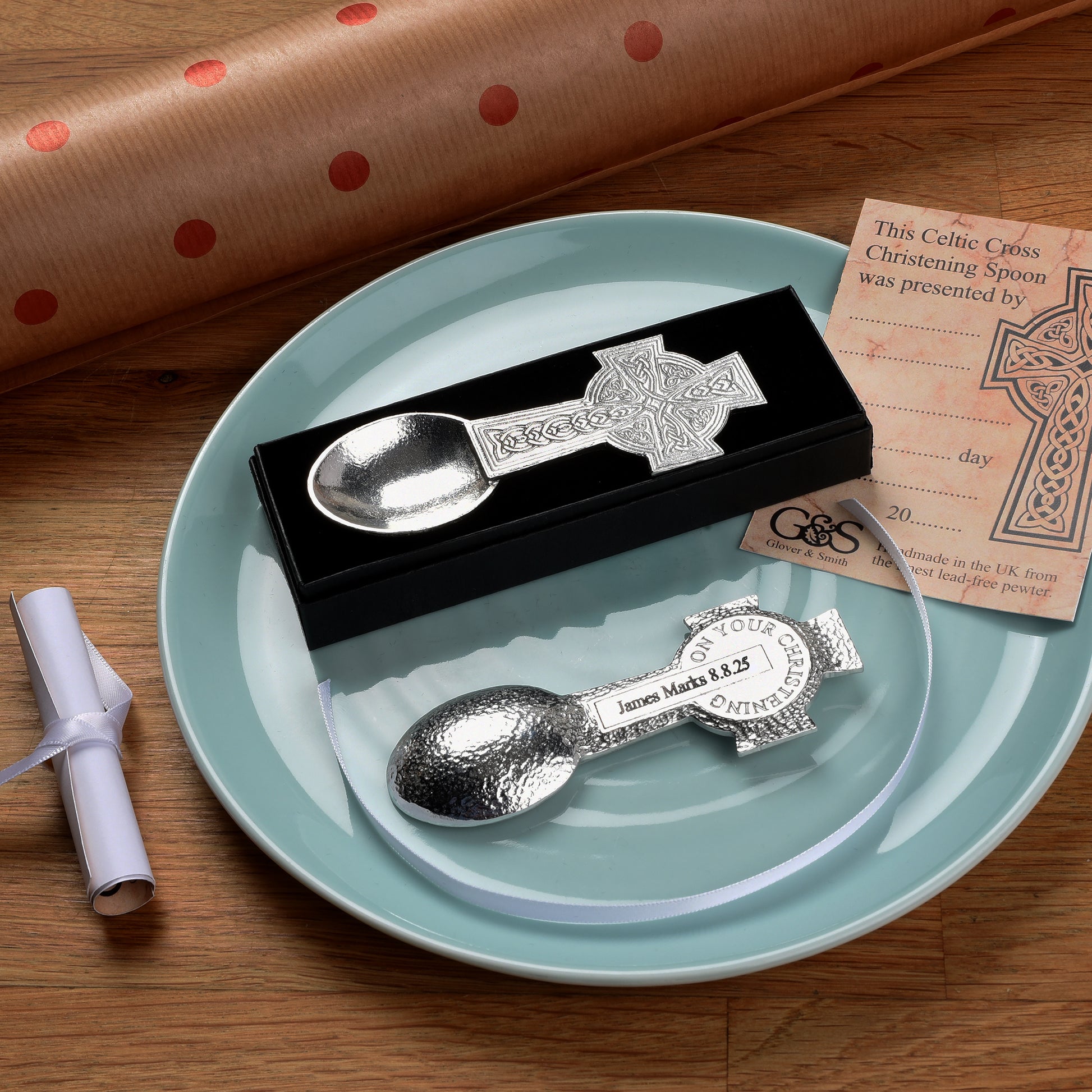 A Celtic cross designed Christening spoon with the words On Your Christening on the back. We engrave your message on the central panel. Christening gifts for boys and girls. UK handmade