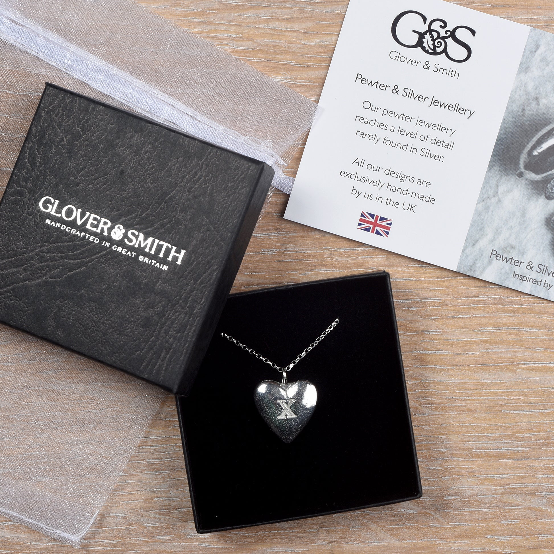 10th Anniversary gifts for her, tin gifts. A stylish and elegant pewter heart necklace with a X (signifying 10) engraved onto one side on an 18 inch Sterling silver chain.