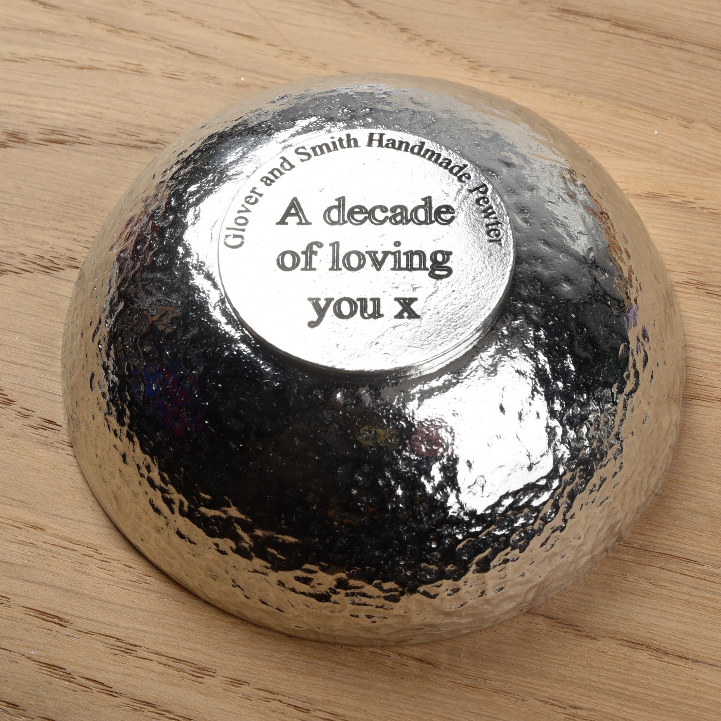 Pewter bowl showing personalised engraving on its base made by Glover and Smith