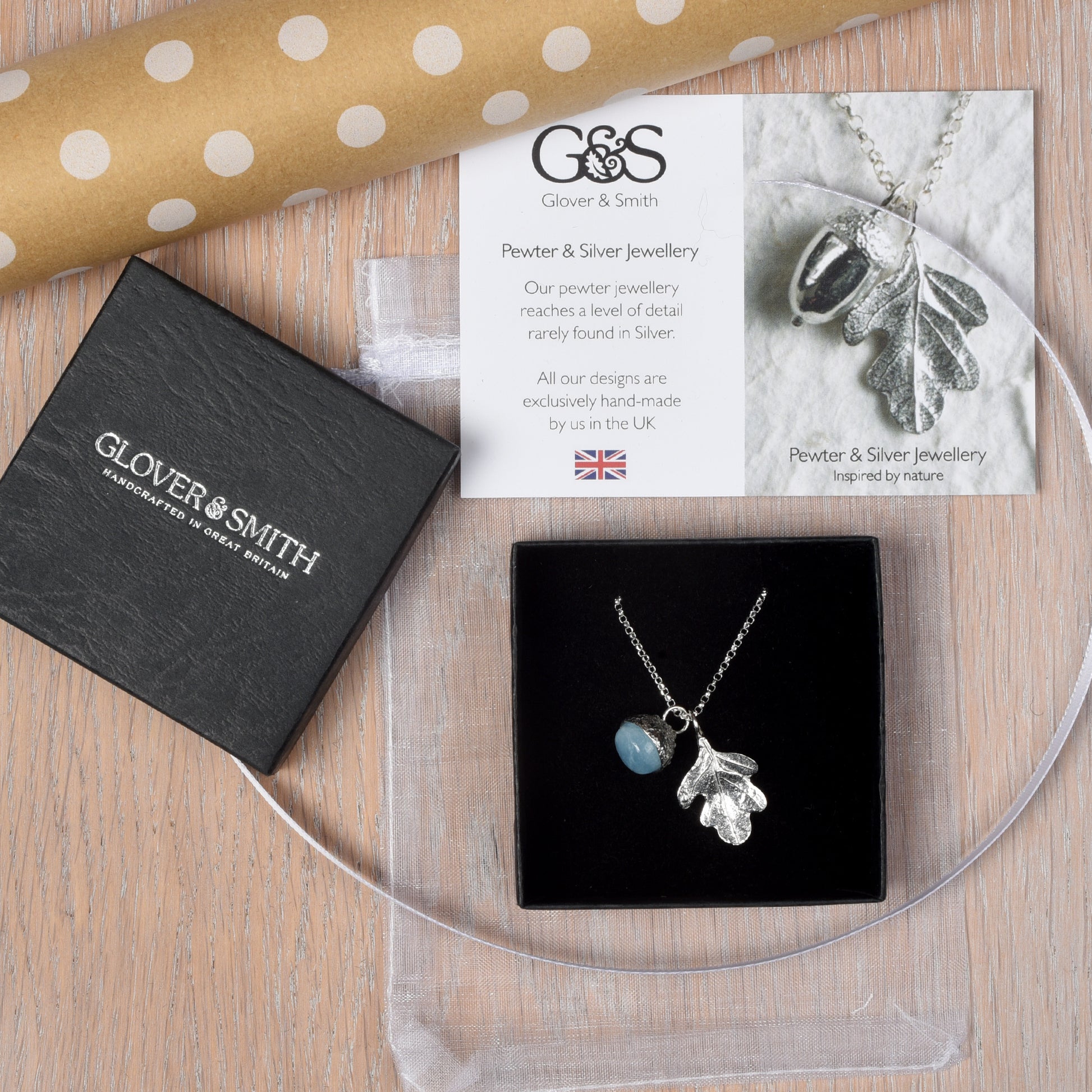 Pewter jewellery, an oak leaf necklace with an acorn cup with an aquamarine stone in it, March birthstone jewellery on a Sterling silver chain showing packaging