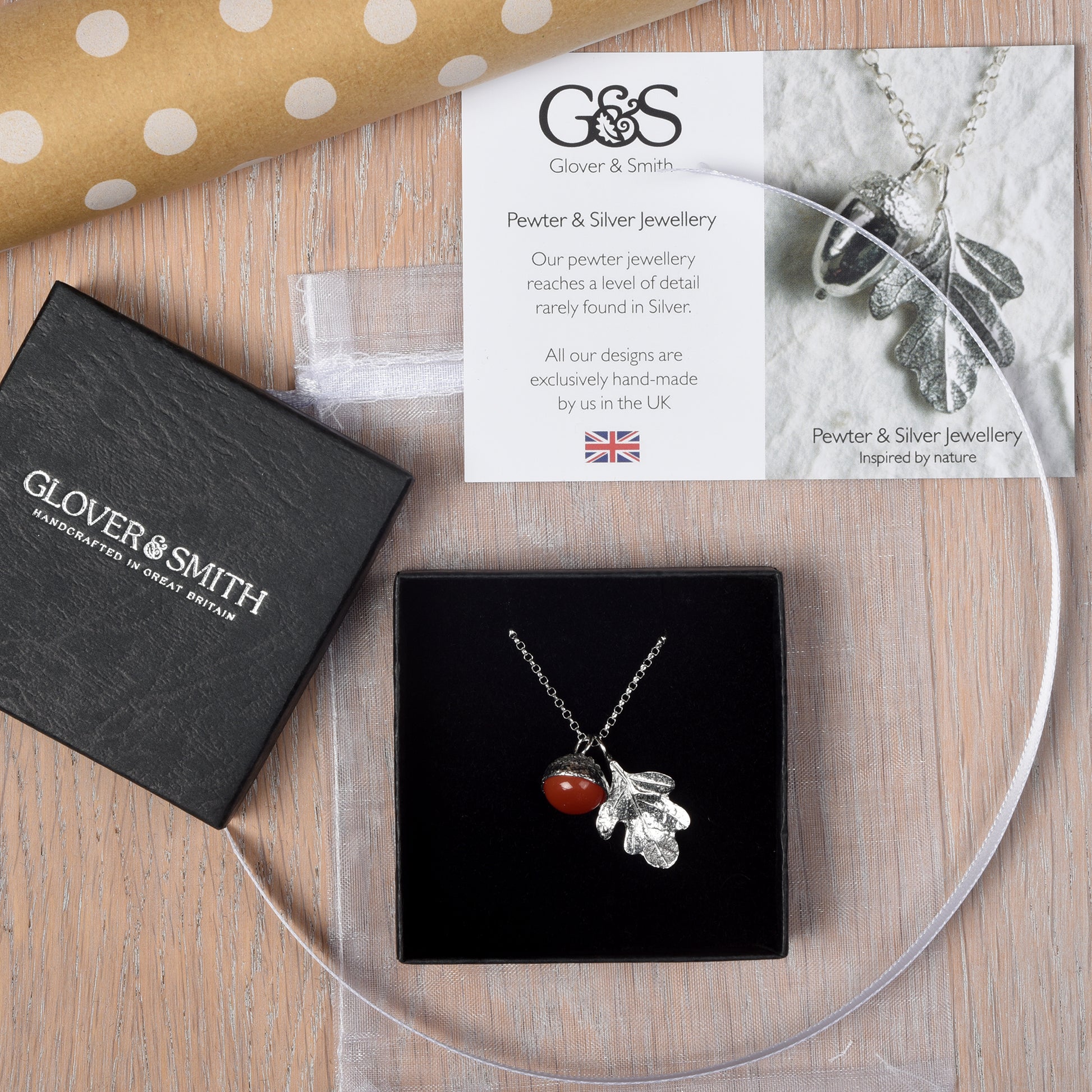 Carnelian acorn pewter necklace in its Glover and Smith packaging