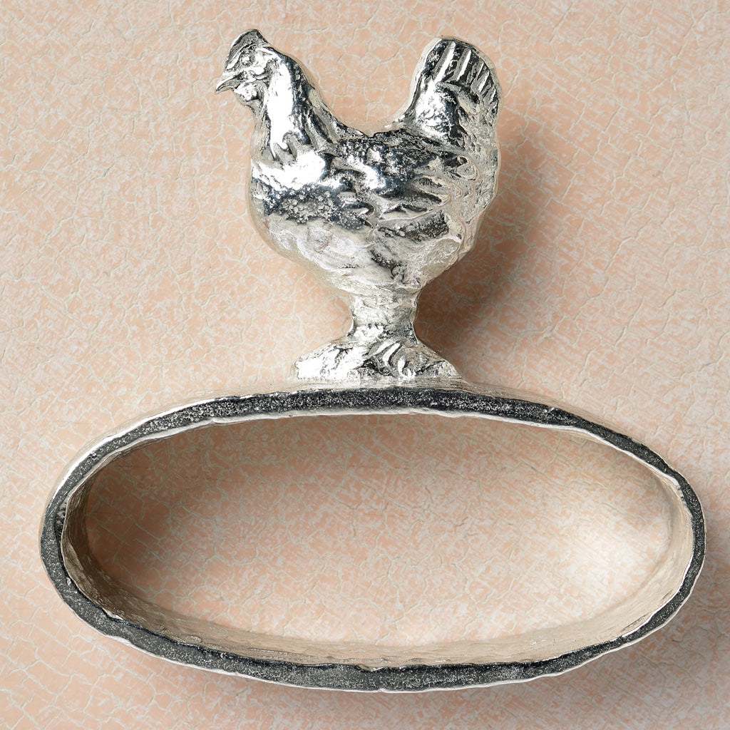 pewter napkin ring with a chicken sculpture on the top