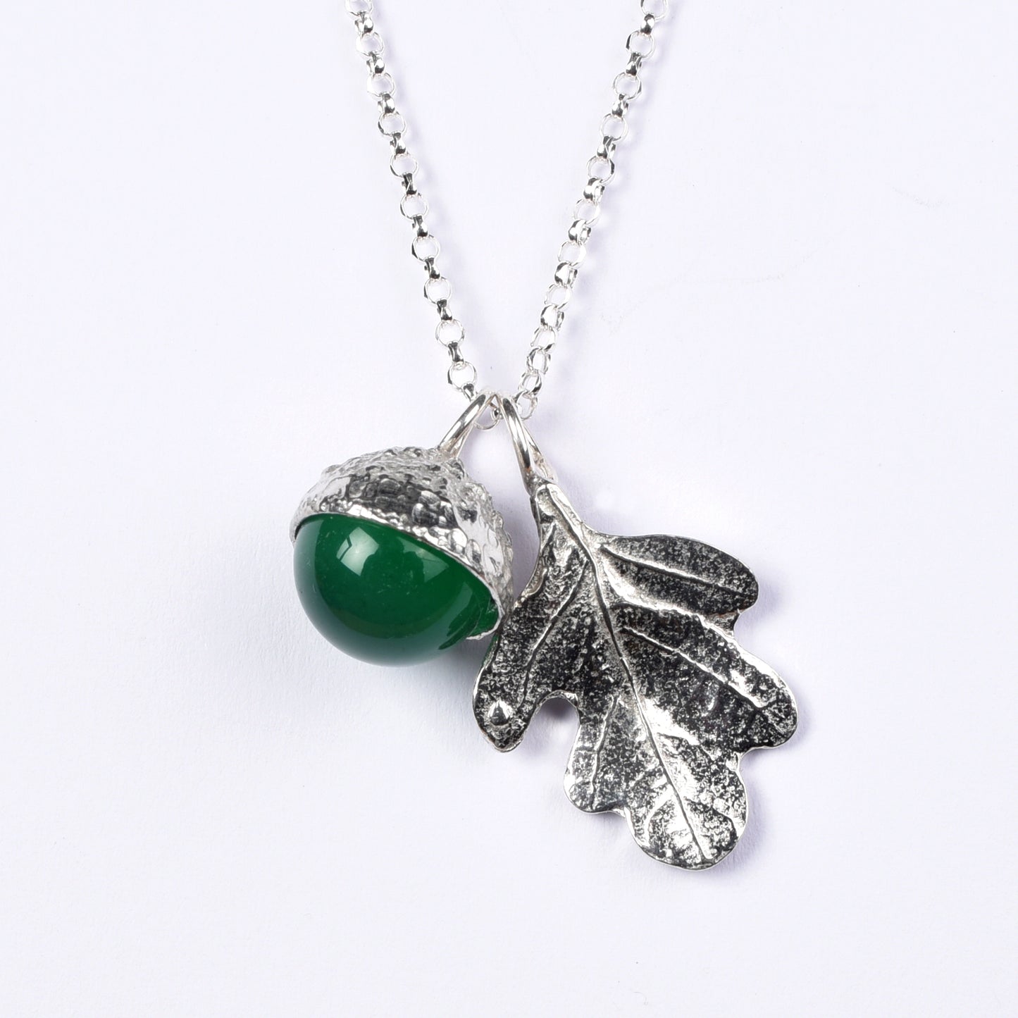 Pewter jewellery, an oak leaf necklace with an acorn cup with an green agate stone in it, May birthstone jewellery on a Sterling silver chain.