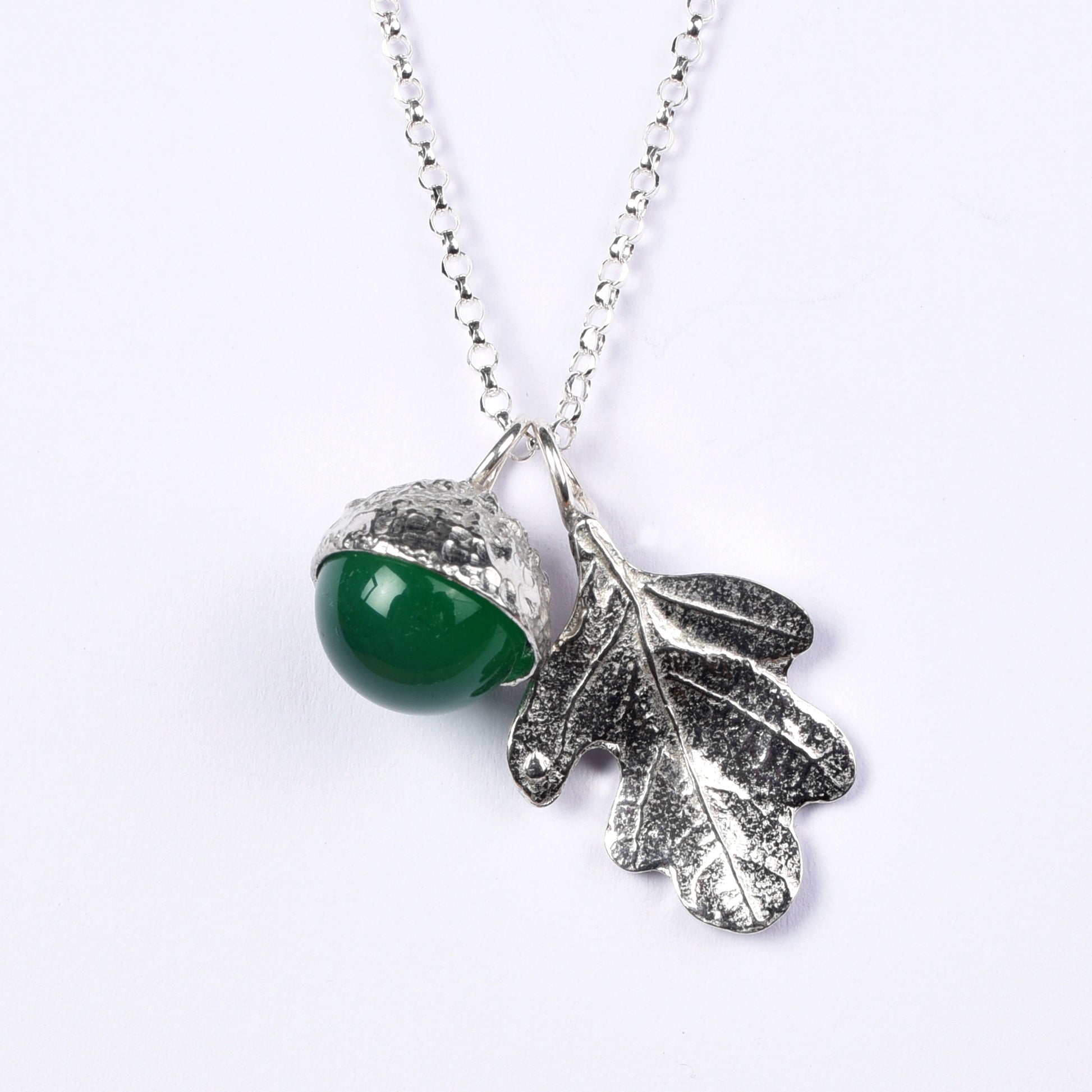 Pewter jewellery, an oak leaf necklace with an acorn cup with an green agate stone in it, May birthstone jewellery on a Sterling silver chain.