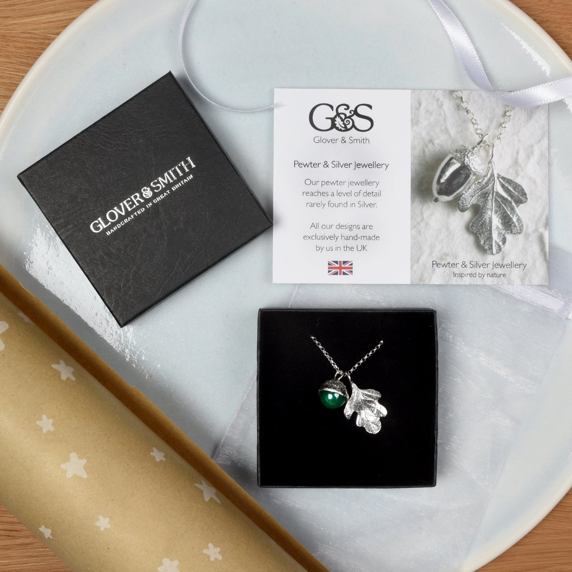 Pewter jewellery, an oak leaf necklace with an acorn cup with an green agate stone in it, May birthstone jewellery on a Sterling silver chain.