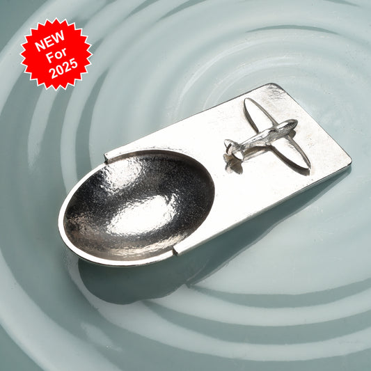 A personalised Spitfire pewter coffee measure scoop spoon. We engrave the back of this contemporary coffee spoon with your own personal message, name or date. The spoon can also be used as a tea caddy spoon or a sugar spoon.