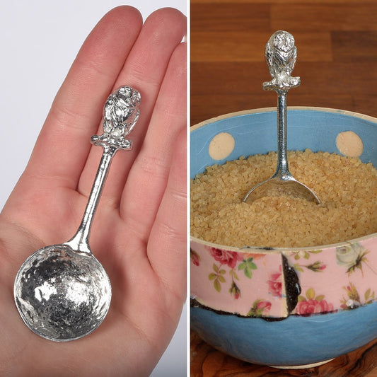 A small spoon pewter sugar spoon. A round bowled spoon on a straight handle leads to a perfectly sculpted owl. Practical & useful bird gifts for bird lovers. UK handmade