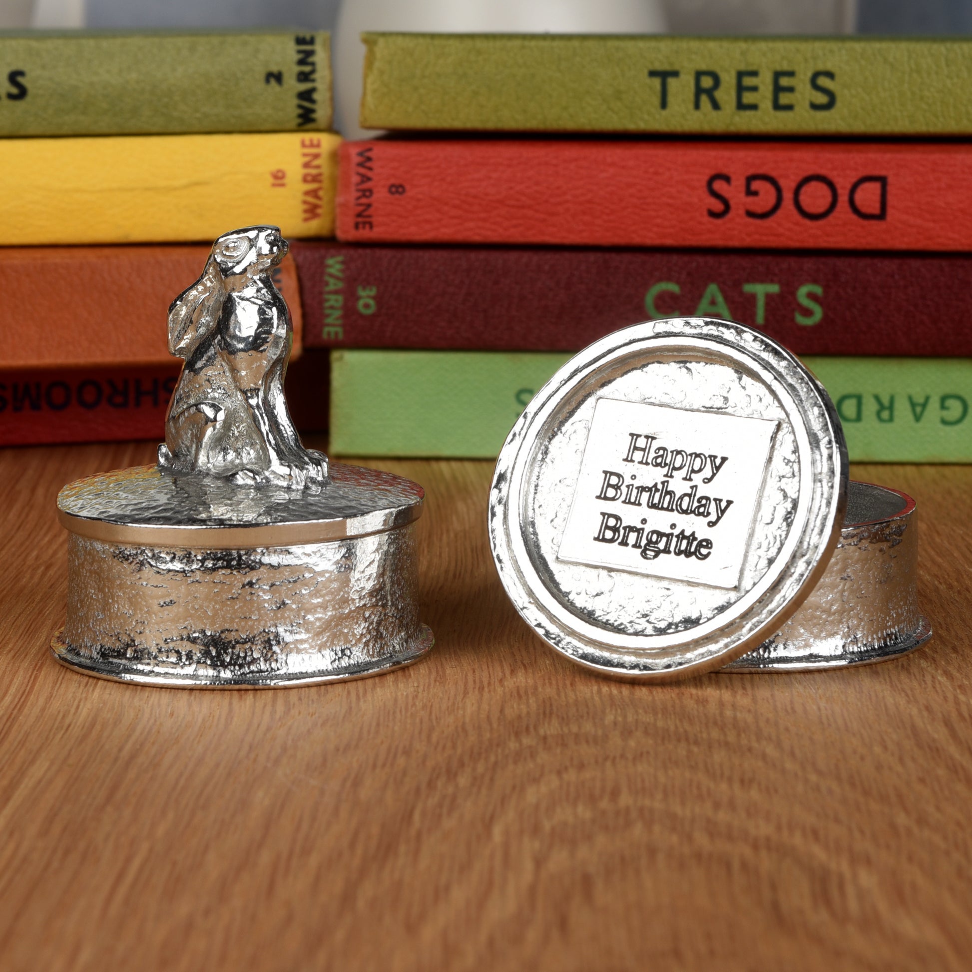 Hare pewter personalised trinket box. Our round keepsake box features a moongazing hare sculpture as a handle. The underside of the lid can be engraved with your personalised message. Hare gifts, personalised gifts for hare lovers. Country gifts.