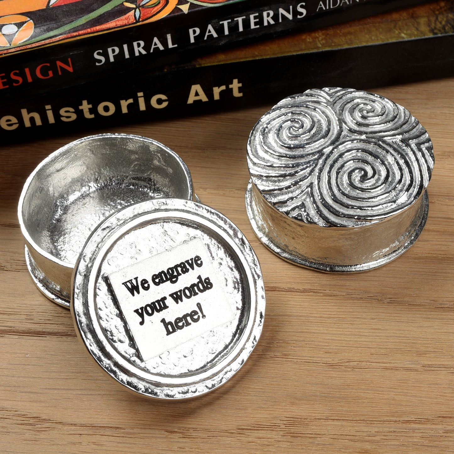 A detailed Neolithic Spiral of Life Treskelion pewter trinket box. We can engrave your message on the lid. The lid features a relief of the spiral of life found in many Neolithic carvings. Celtic gifts.