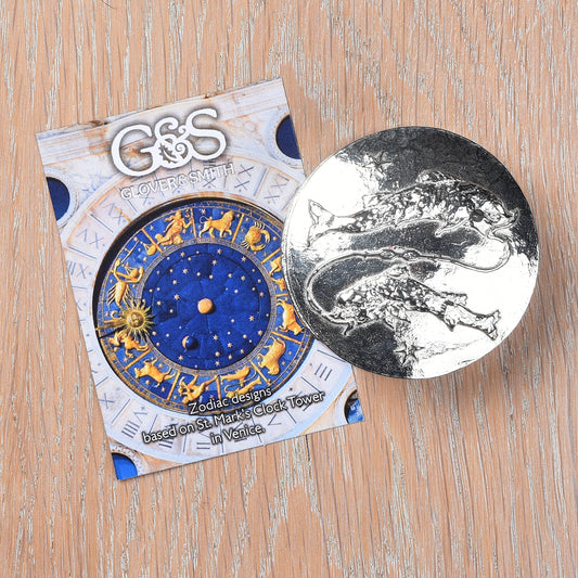 A beautifully detailed and textured Pisces zodiac sign guards precious treasure on this lovely personalised pewter trinket box. The underside of the lid can be engraved with your personalised message. Birthday gifts for Pisceans.