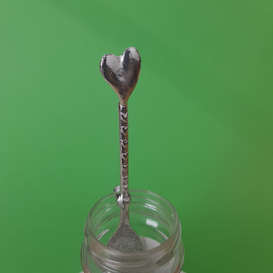 Love spoon. Long pewter jam spoon with a hook to hang on any jar. The top of the spoon has a heart on it.