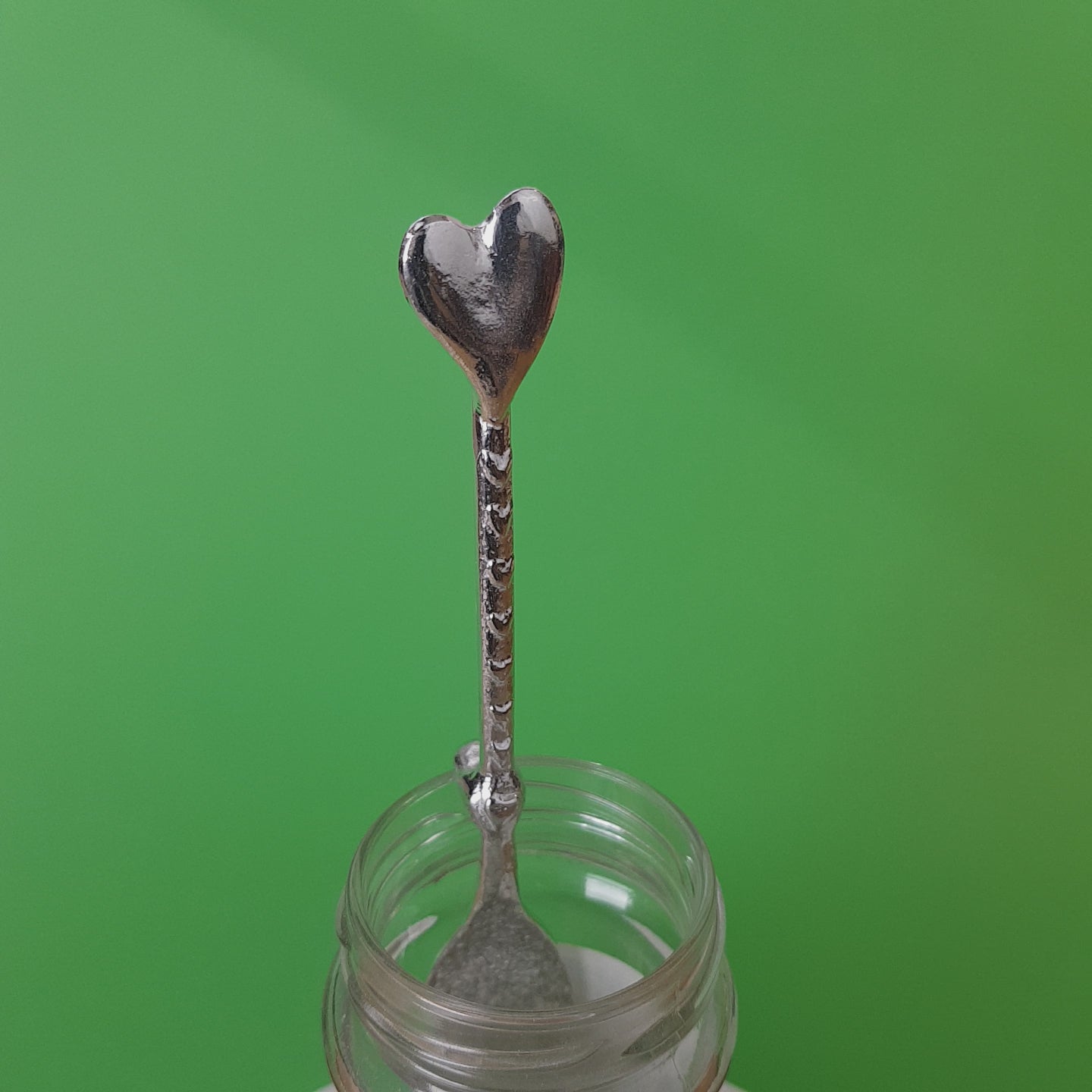 Love spoon. Long pewter jam spoon with a hook to hang on any jar. The top of the spoon has a heart on it.