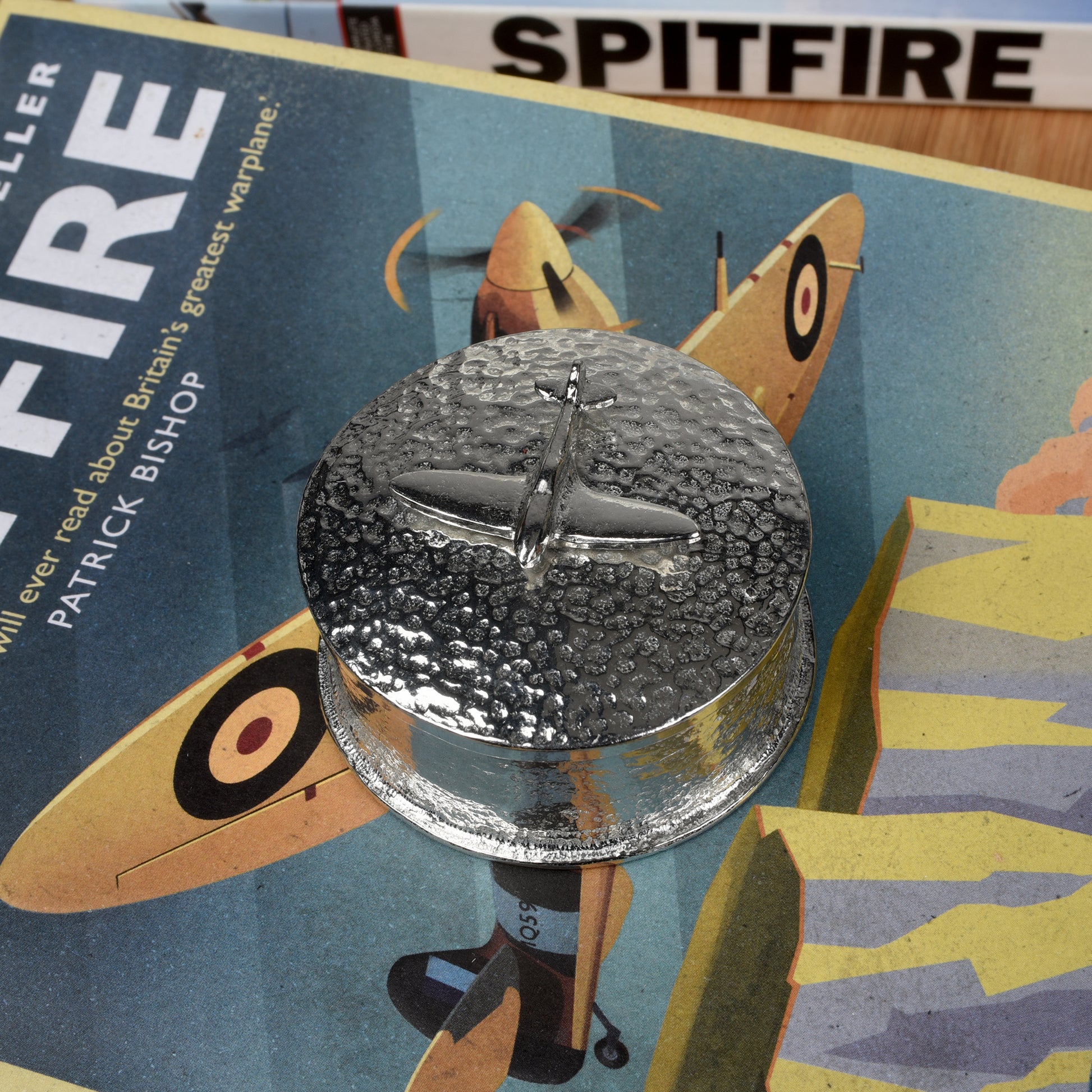 Spitfire gifts, a personalised, engraved 5 cm round pewter box with a Spitfire aeroplane sculpture on the lid. Gifts for Spitfire lovers.