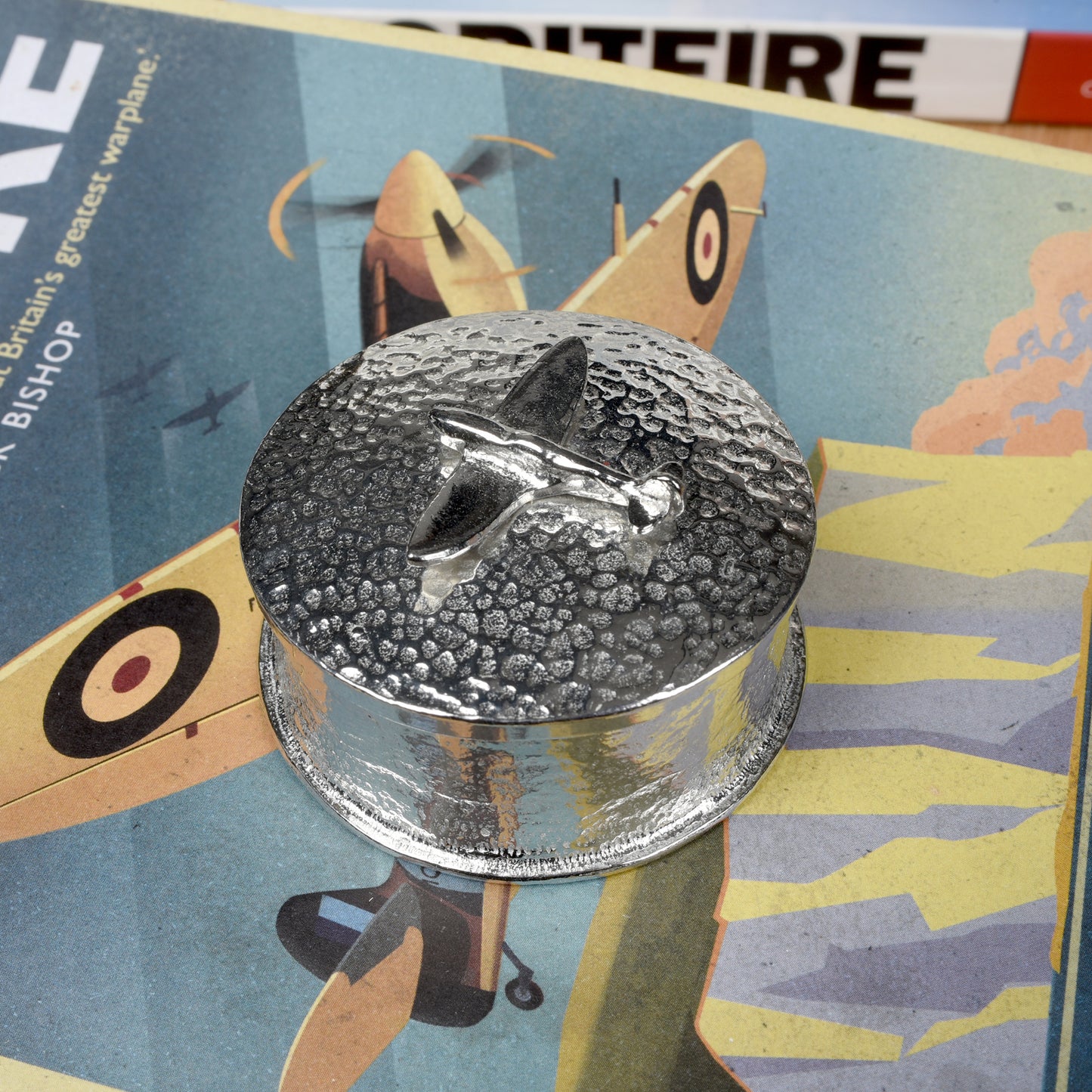 Spitfire gifts, a personalised, engraved 5 cm round pewter box with a Spitfire aeroplane sculpture on the lid. Gifts for Spitfire lovers.