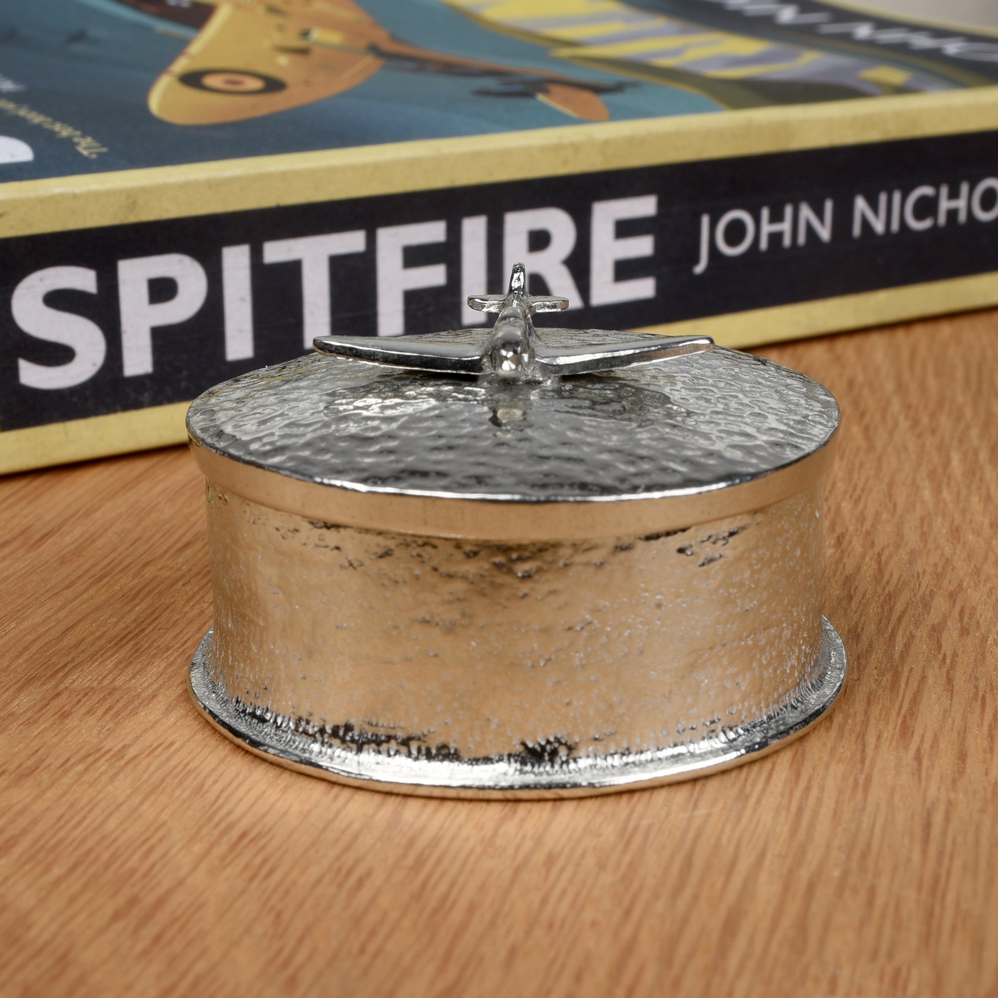 Spitfire gifts, a personalised, engraved 5 cm round pewter box with a Spitfire aeroplane sculpture on the lid. Gifts for Spitfire lovers.