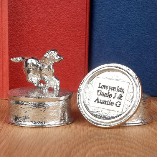 Spaniel pewter personalised trinket box. Our round spaniel keepsake box features a running springer spaniel sculpture as a handle. The underside of the lid can be engraved with your personalised message. Dog gifts, personalised gifts for dog lovers.