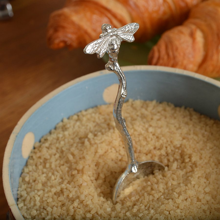 A small spoon pewter sugar spoon with a bee on the end of a twig handle. Unusual, useful and tactile gifts for bee lovers, bee gifts handmade in the UK