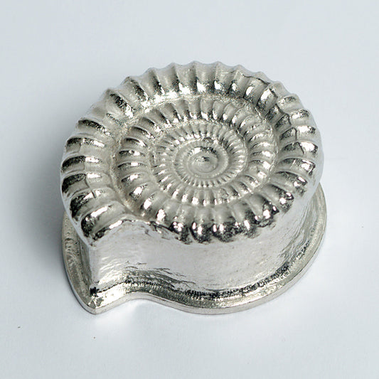 Ammonite pewter trinket box. A small fossil shaped keepsake box in the shape of an ammonite fossil. We used a real ammonite found in Dorset to capture the true texture and feel of a real fossil. Geology gifts made in Britain.