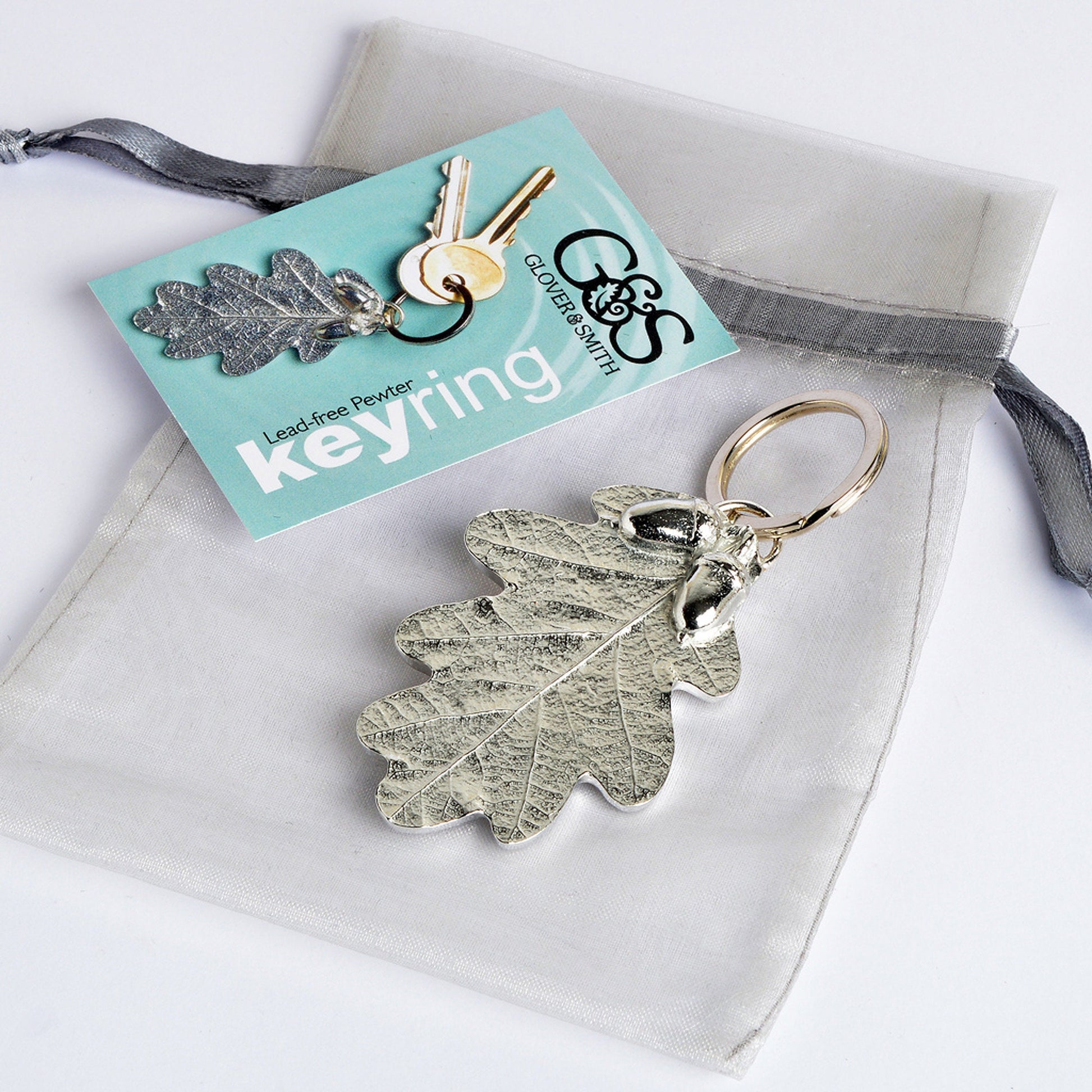 A detailed and beautifully textured oak leaf and acorn keyring. A large, strong and sturdy English pewter oak leaf keyring on a stainless steel ring. Oak and acorn gifts, housewarming gifts UK handmade