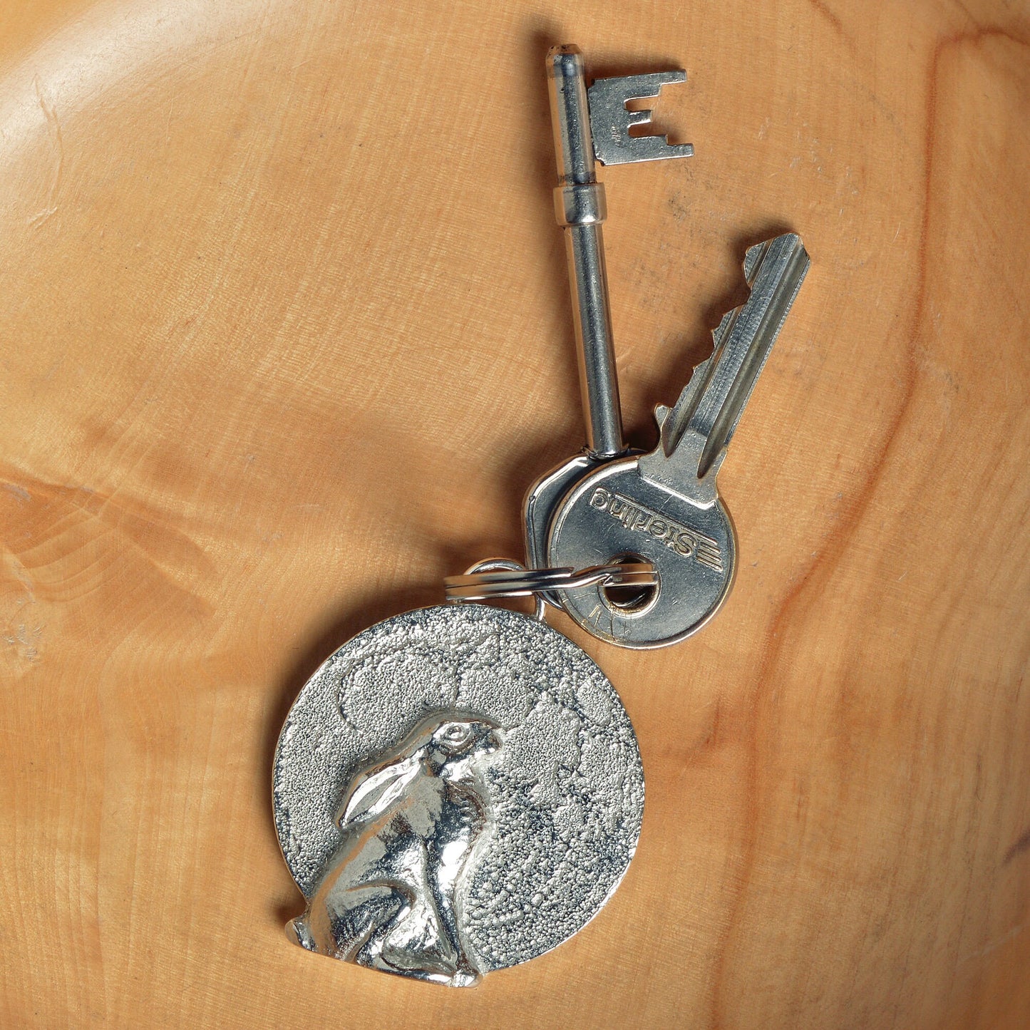  A hare gazes at a beautifully textured moon. Solid pewter hare keyring on a quality stainless steel ring. Hare gifts, gifts for hare lovers, Pewter keyring gifts. Housewarming gifts, moon staring hare keyring, moongazing hare gifts