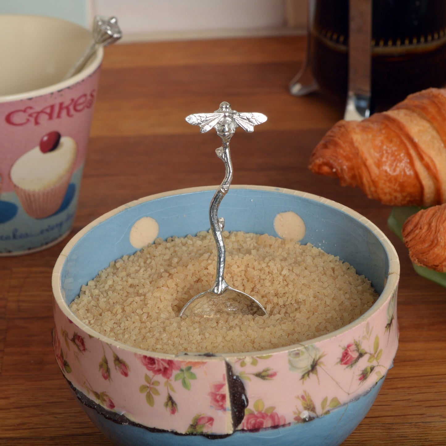 A small spoon pewter sugar spoon with a bee on the end of a twig handle. Unusual, useful and tactile gifts for bee lovers, bee gifts handmade in the UK