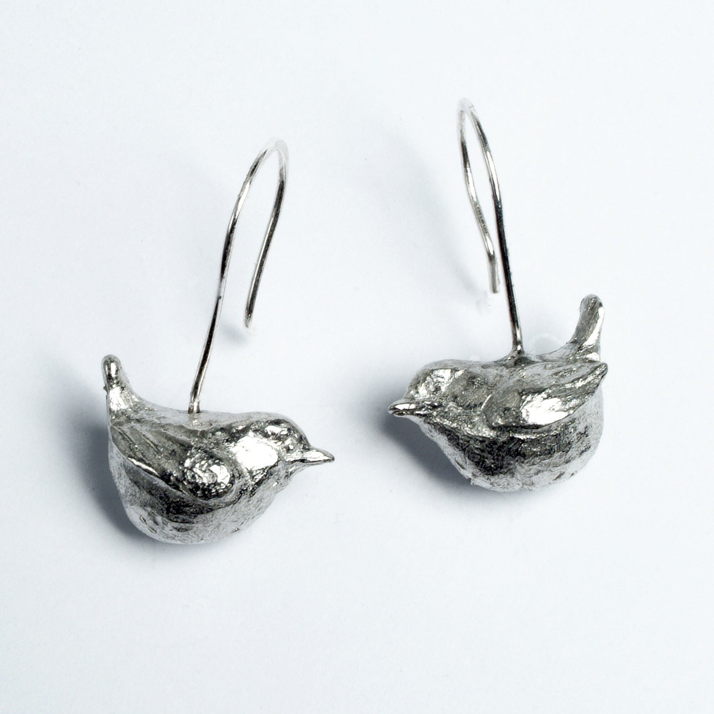 Wren bird drop earrings, pewter wrens on Sterling silver ear hooks. Pewter and silver wren jewellery gifts, handmade in the UK by Glover and Smith