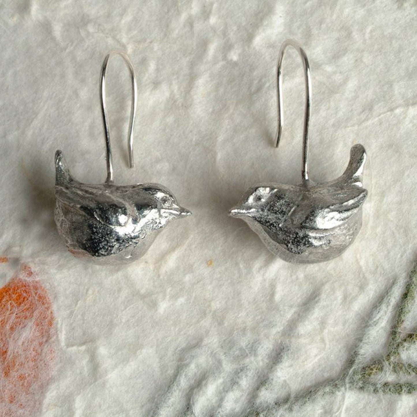 Wren bird drop earrings, pewter wrens on Sterling silver ear hooks. Pewter and silver wren jewellery gifts, handmade in the UK by Glover and Smith