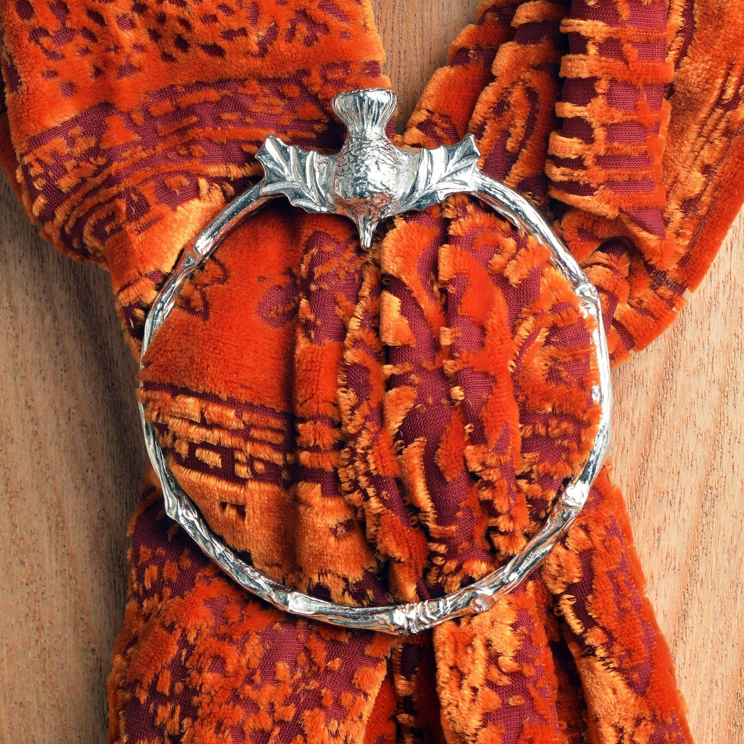 Thistle scarf ring. A splendid Scottish thistle sits on the top of a twig textured ring on this decorative pewter ring for scarves. It will fit most large velvet, silk, cotton or wool scarves. Scottish gifts For her, thistle gifts, gifts for Scots.