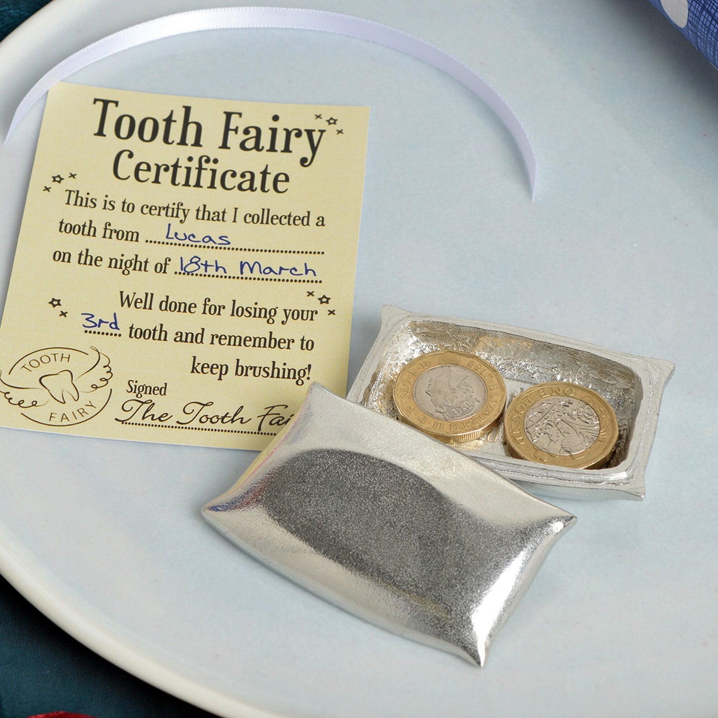 A tooth fairy box. A pewter pillow shaped box with the words 'From the tooth Fairy' written inside the lid. With gift certificate. UK handmade