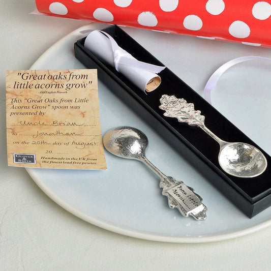 An oak leaf topped pewter spoon with the words 'From little acorns' on the reverse. Christening gifts for boys and girls. UK handmade.