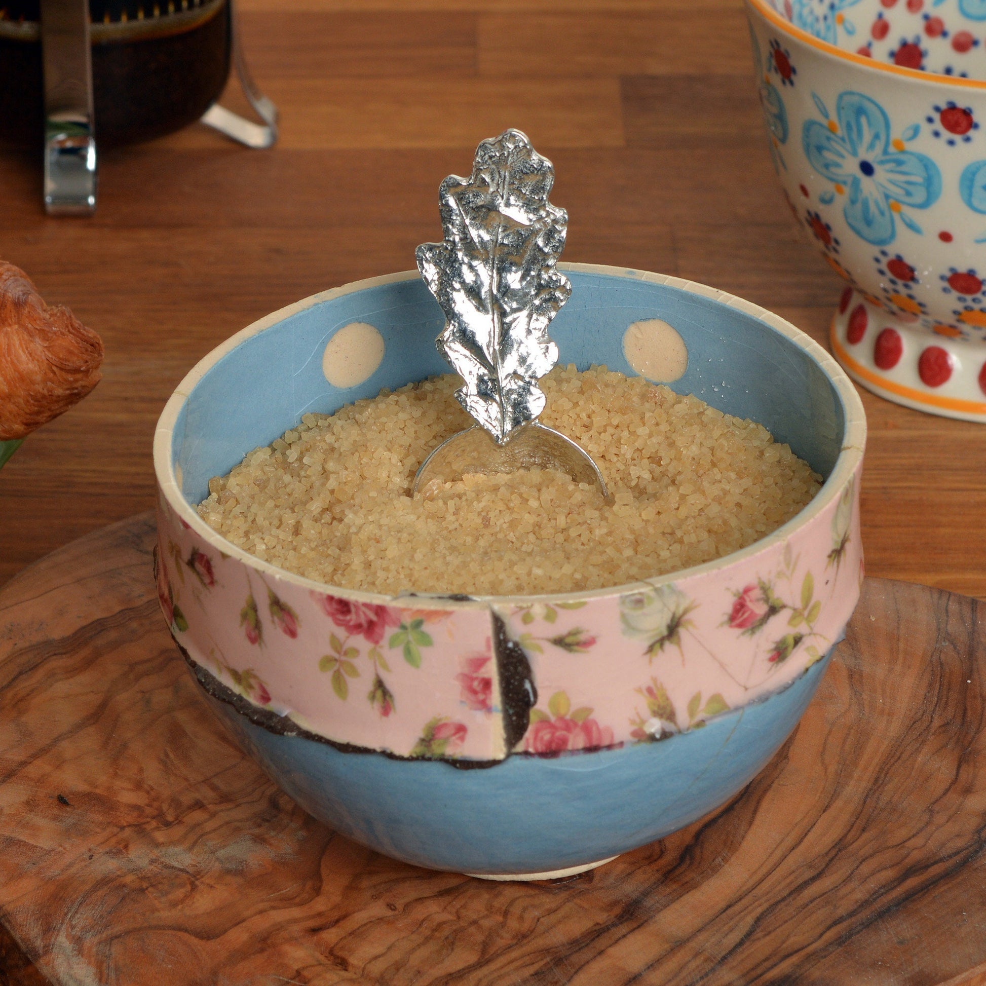 A small spoon pewter sugar spoon with an oak leaf handle. Ideal caddy spoon. Practical & useful oak leaf gifts for nature lovers little acorn gifts UK handmade