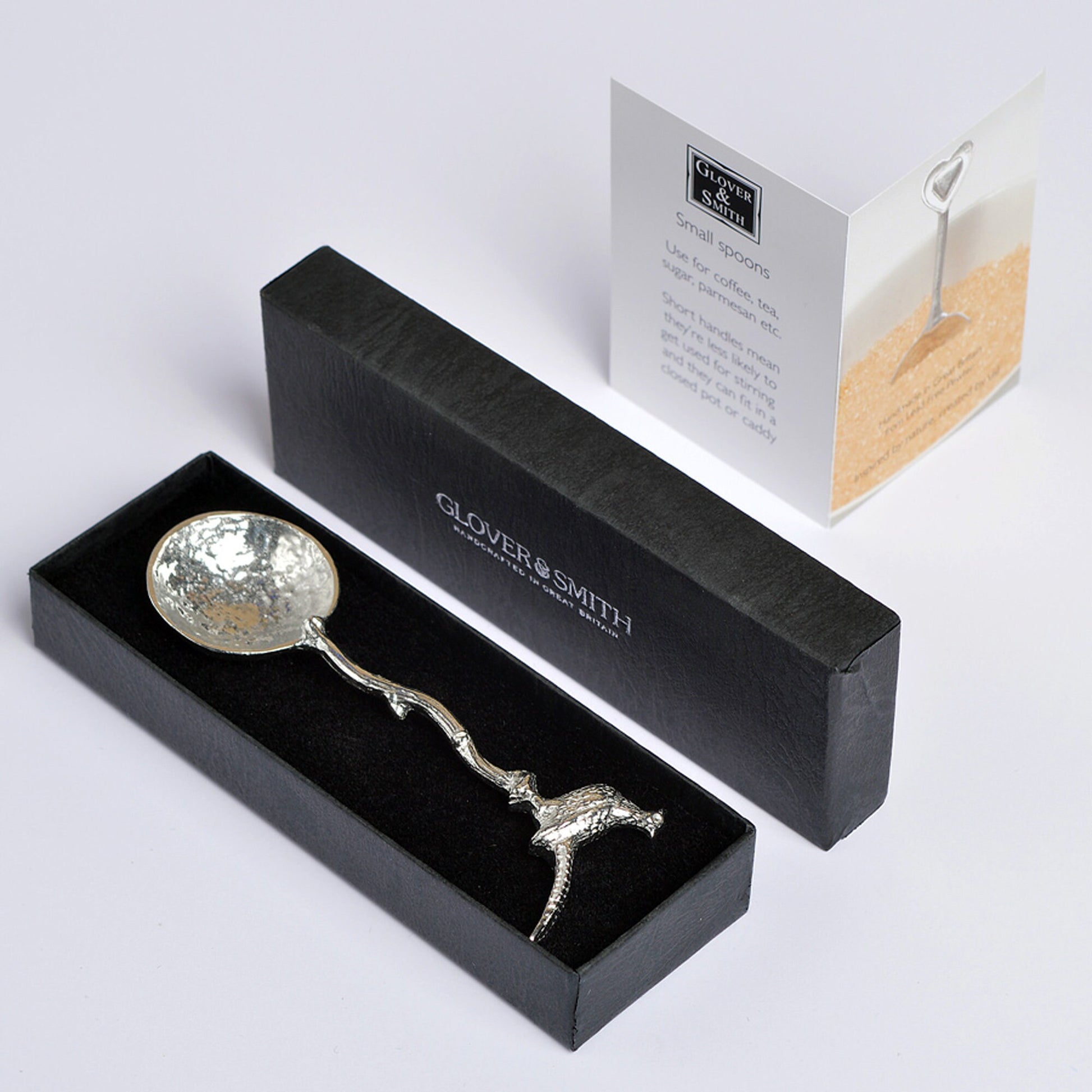 A small spoon pewter sugar spoon with a detailed pheasant on  a twig handle. Unusual, useful and tactile gifts for nature lovers, pheasant shooting gifts handmade in the UK useful countryside gifts