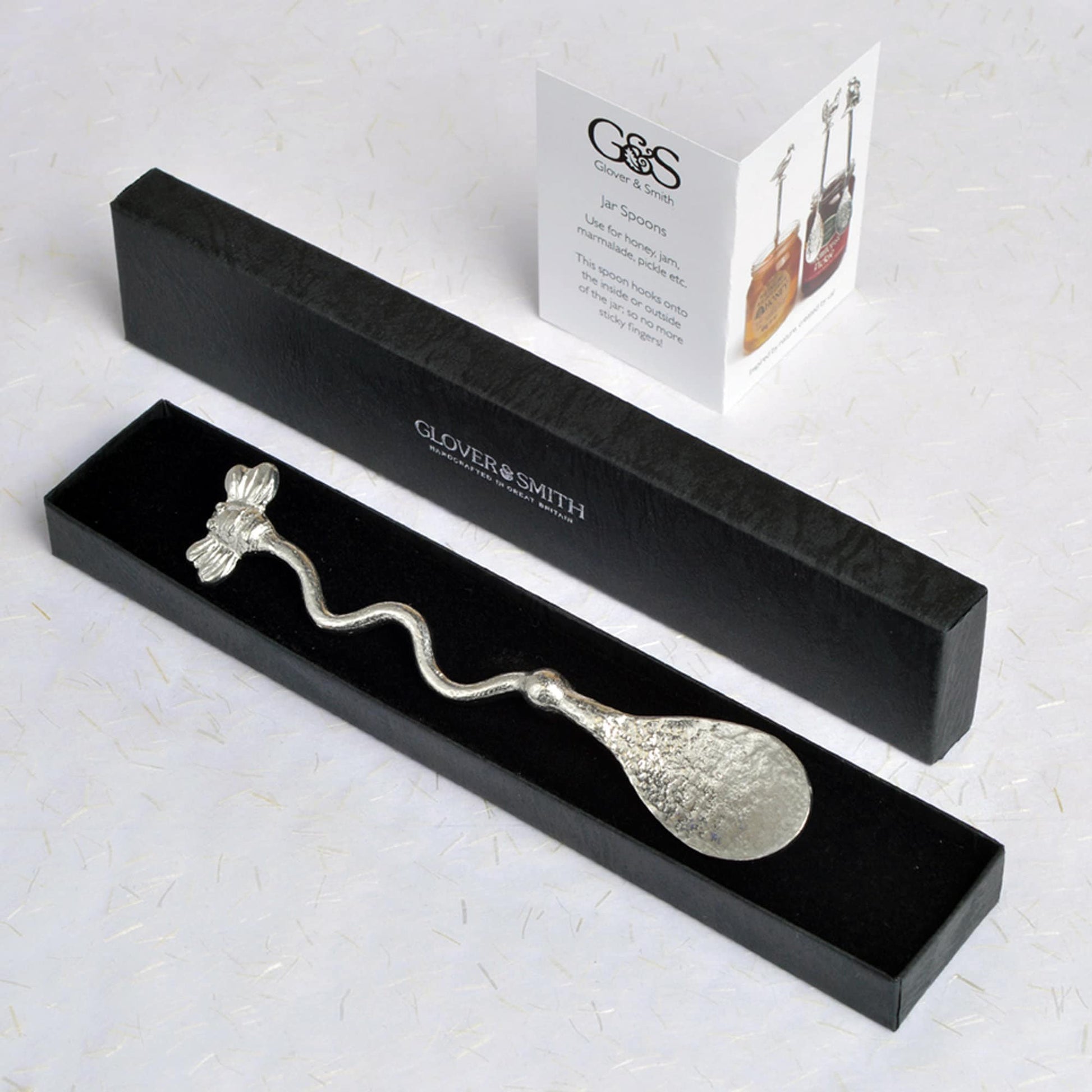 A long handled pewter honey spoon with a bee on the end and a hook to hang from any jar. Ideal gifts for bee Lovers and honey lovers. No more sticky fingers with our long handled spoons. UK made bee gifts. Ideal jam spoons or honey spoons.