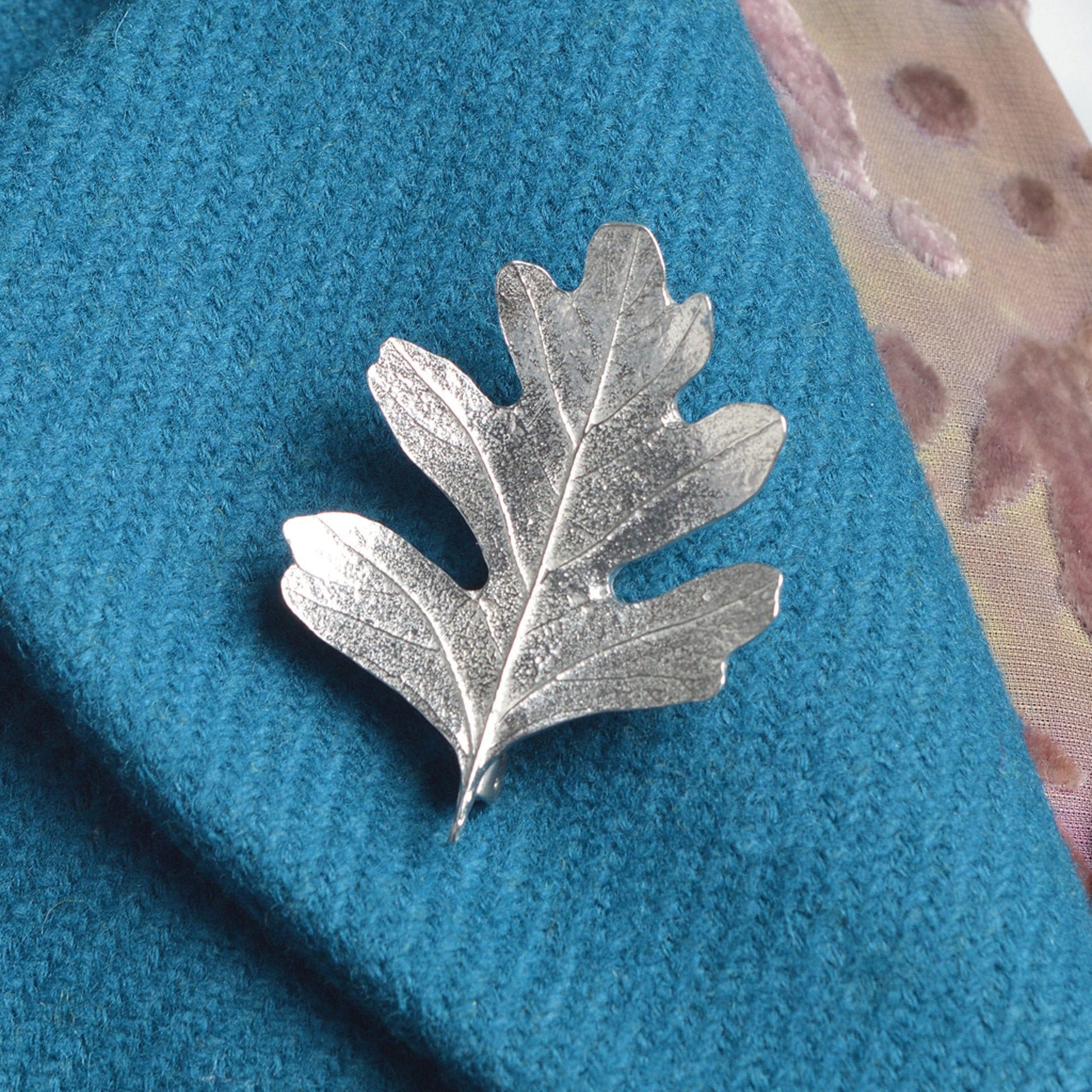 Hawthorn leaf pewter brooch, leaf jewellery gifts for her. Each hawthorn leaf brooch is 5.2cm (2.0 inches) tall and is attached with a metal clasp pin. Our hawthorn brooches make great gifts for nature lovers. UK handmade