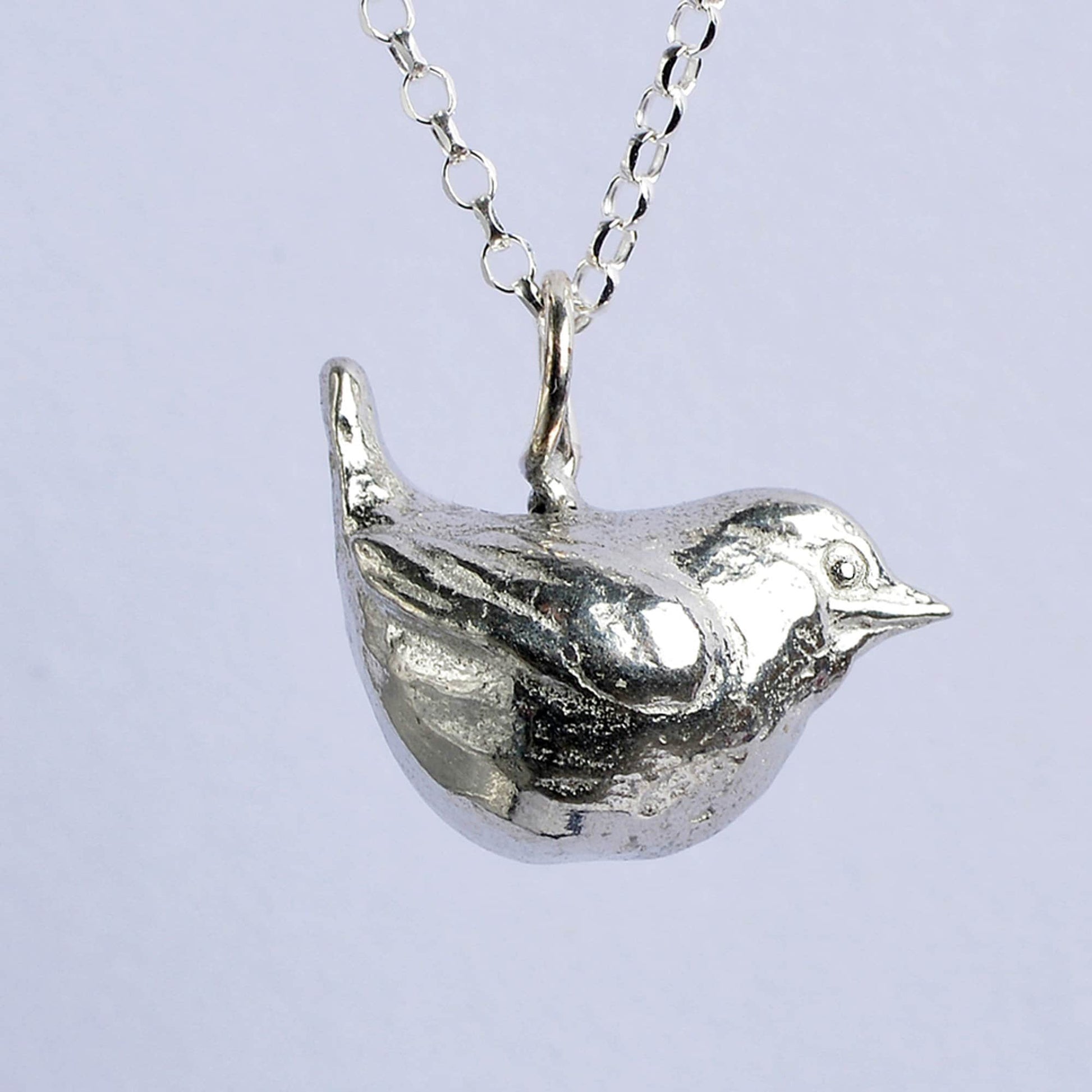 A delicate and detailed pewter wren bird necklace on an 18" Sterling silver chain. Great jewellery gifts for her, bird gifts for bird lovers. The perfect 10th tin 10 year wedding anniversary gift (Our pewter is 95% tin). Made in Britain with love. 