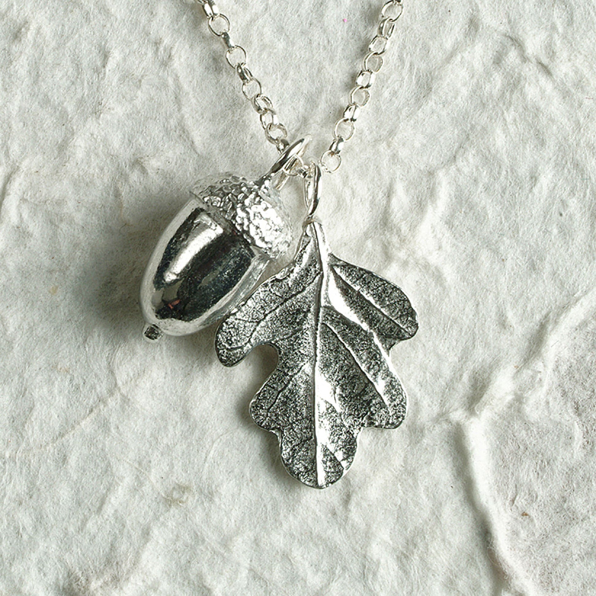 A delicate and detailed pewter oak leaf and acorn necklace on an 18" Sterling silver chain. Great jewellery gifts for her. The perfect 10th tin 10 year wedding anniversary gift (Our pewter is 95% tin). Made in Britain with love.